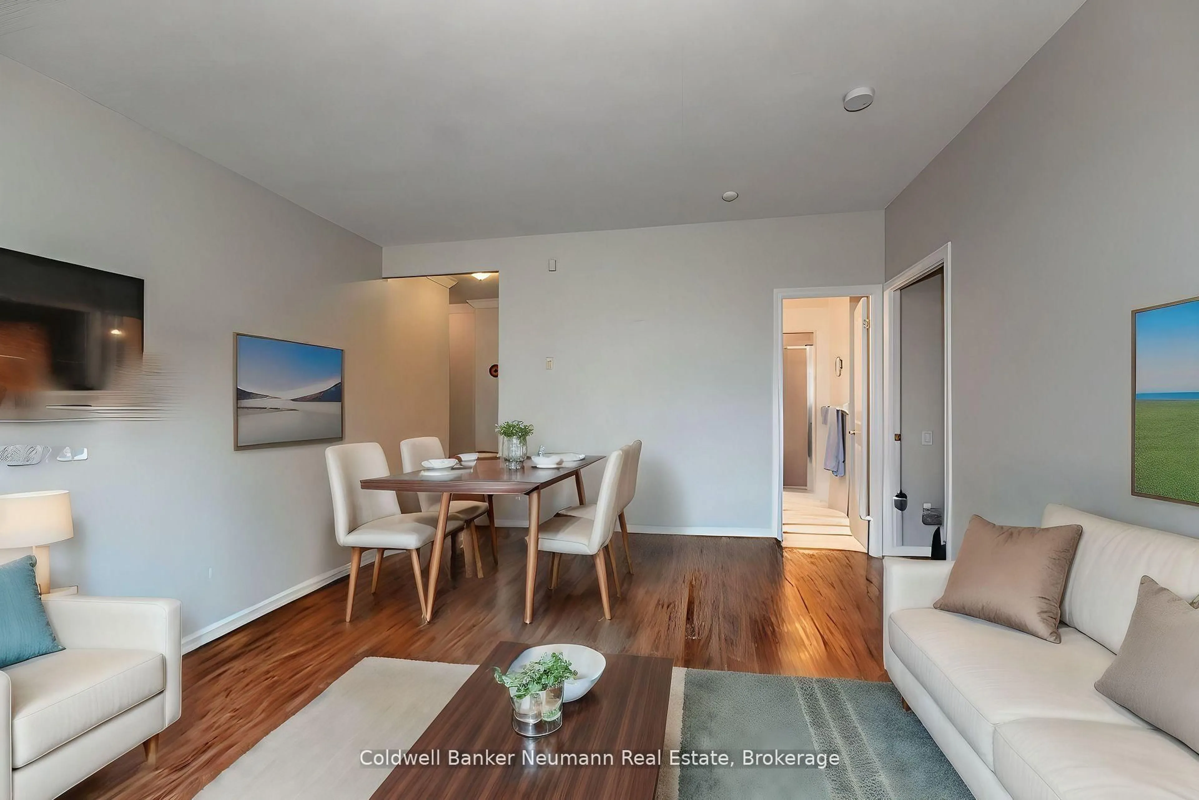 Living room with furniture, wood/laminate floor for 60 Old Mill Rd #409, Oakville Ontario L6J 7V9