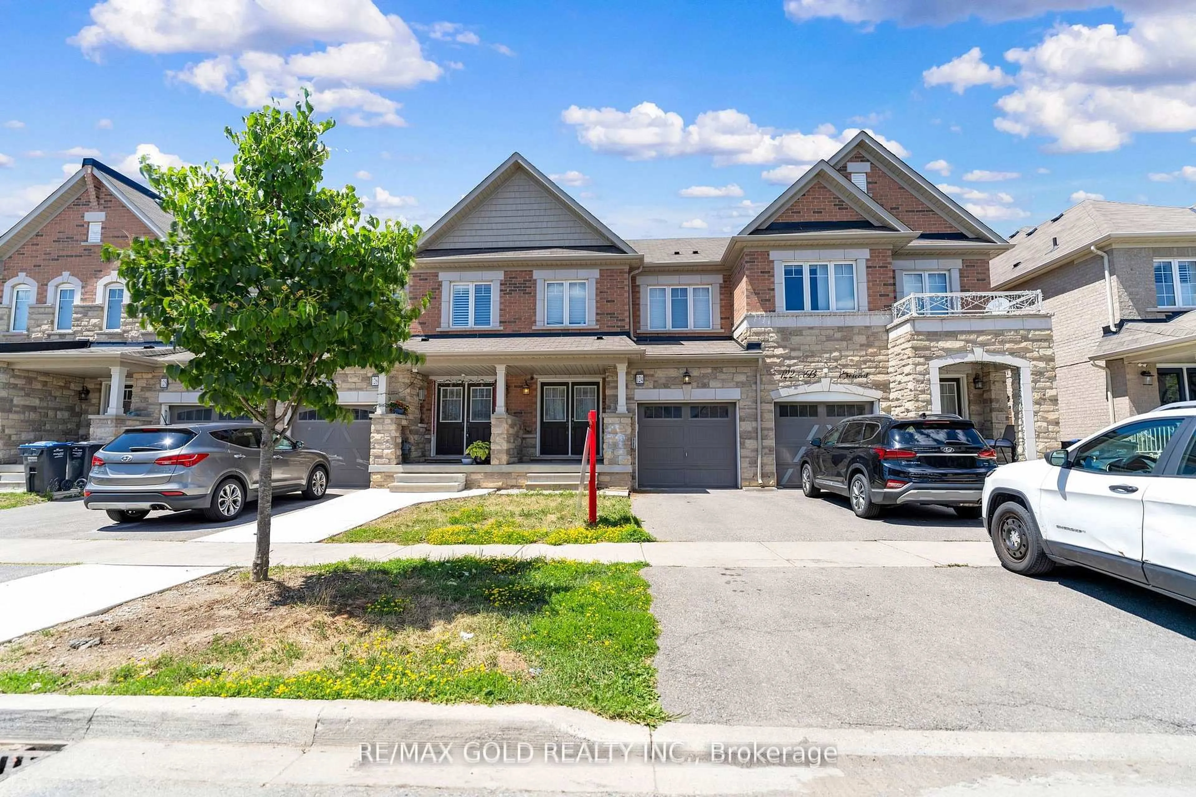 Home with brick exterior material, street for 124 Baffin Cres, Brampton Ontario L7A 0C7