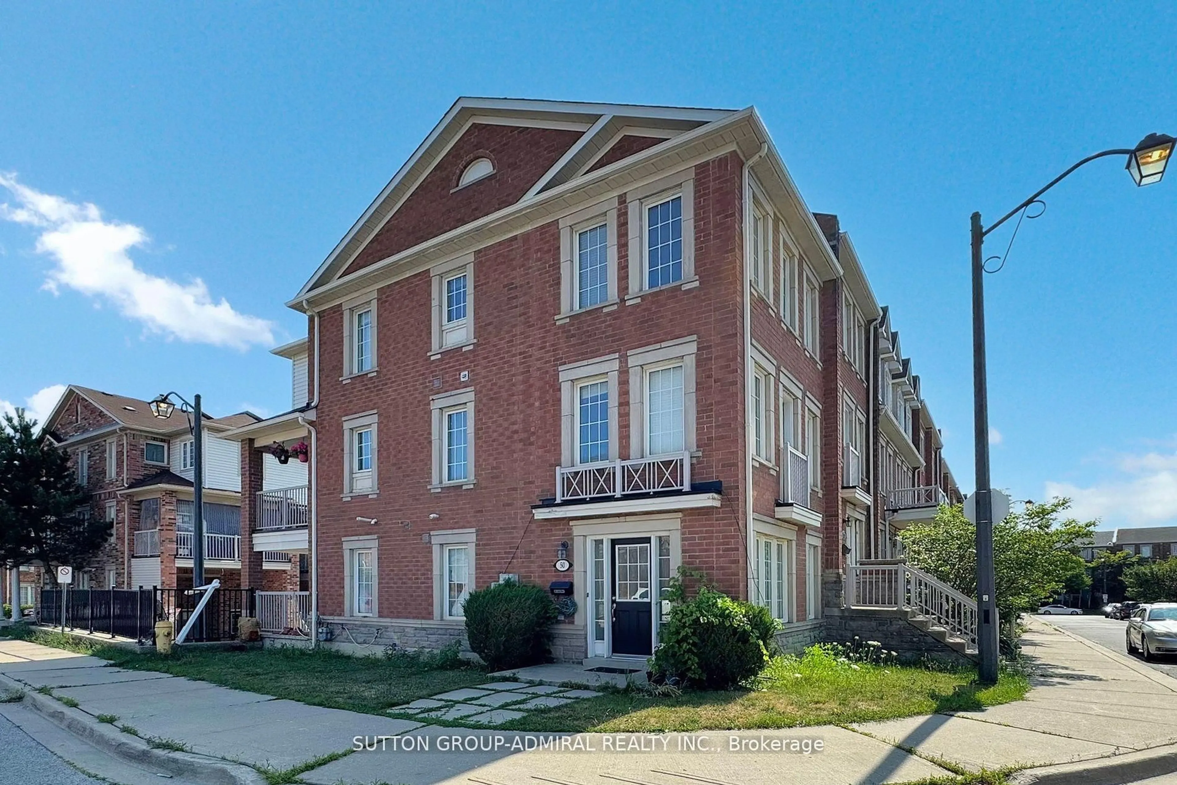Home with brick exterior material, street for 50 Jim Baird Mews, Toronto Ontario M3L 0C5