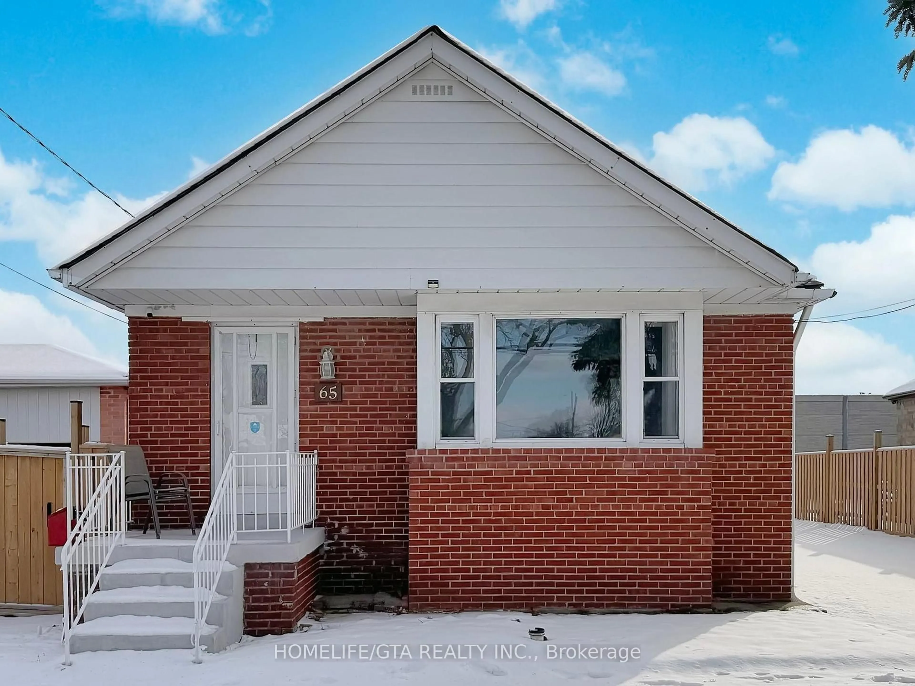 Home with brick exterior material, street for 65 Whitley Ave, Toronto Ontario M3K 1A1