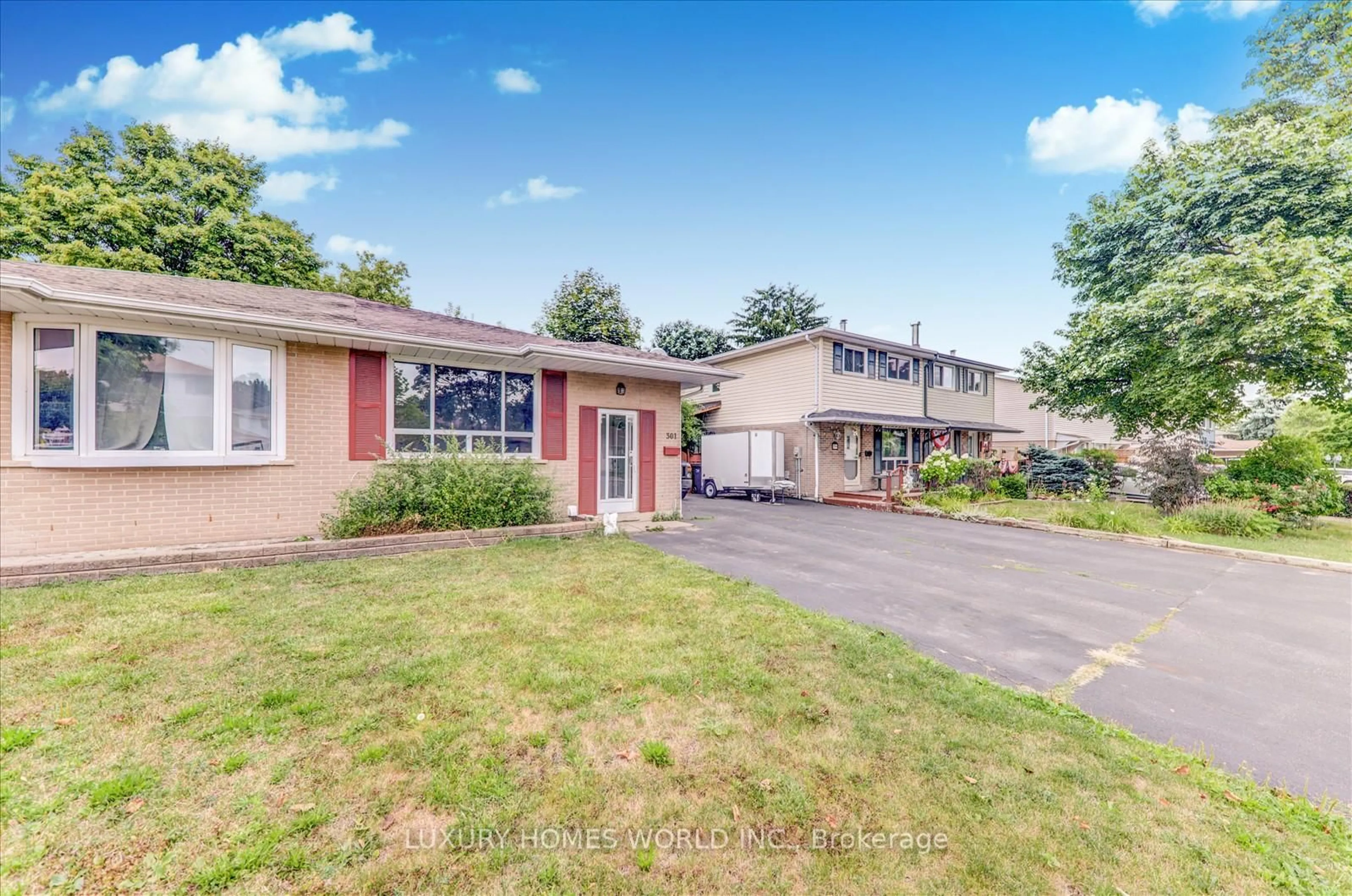 A pic from outside/outdoor area/front of a property/back of a property/a pic from drone, street for 301 Archdekin Dr, Brampton Ontario L6V 1Y8