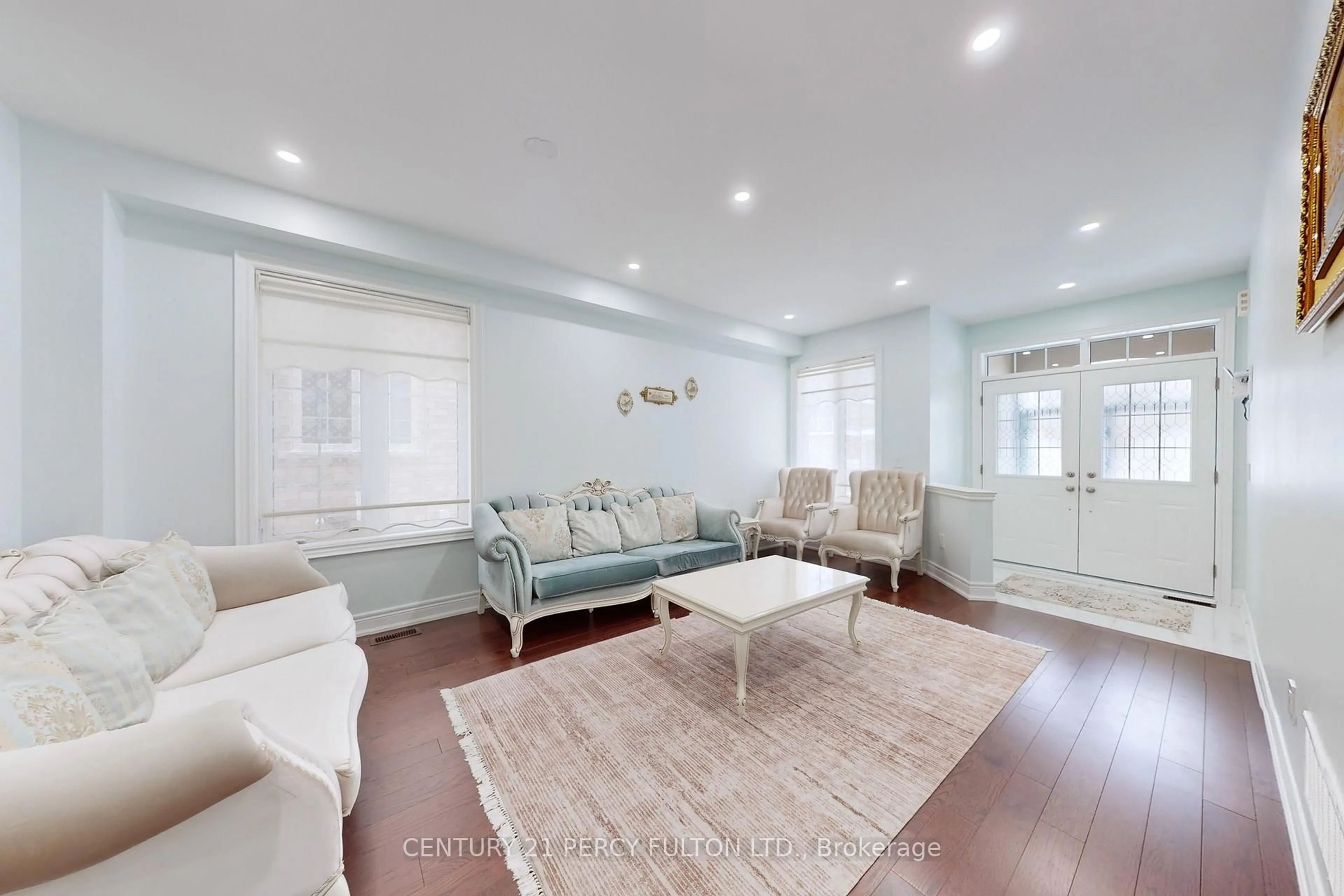 Living room with furniture, wood/laminate floor for 11 Sinatra St, Brampton Ontario L6R 4B3