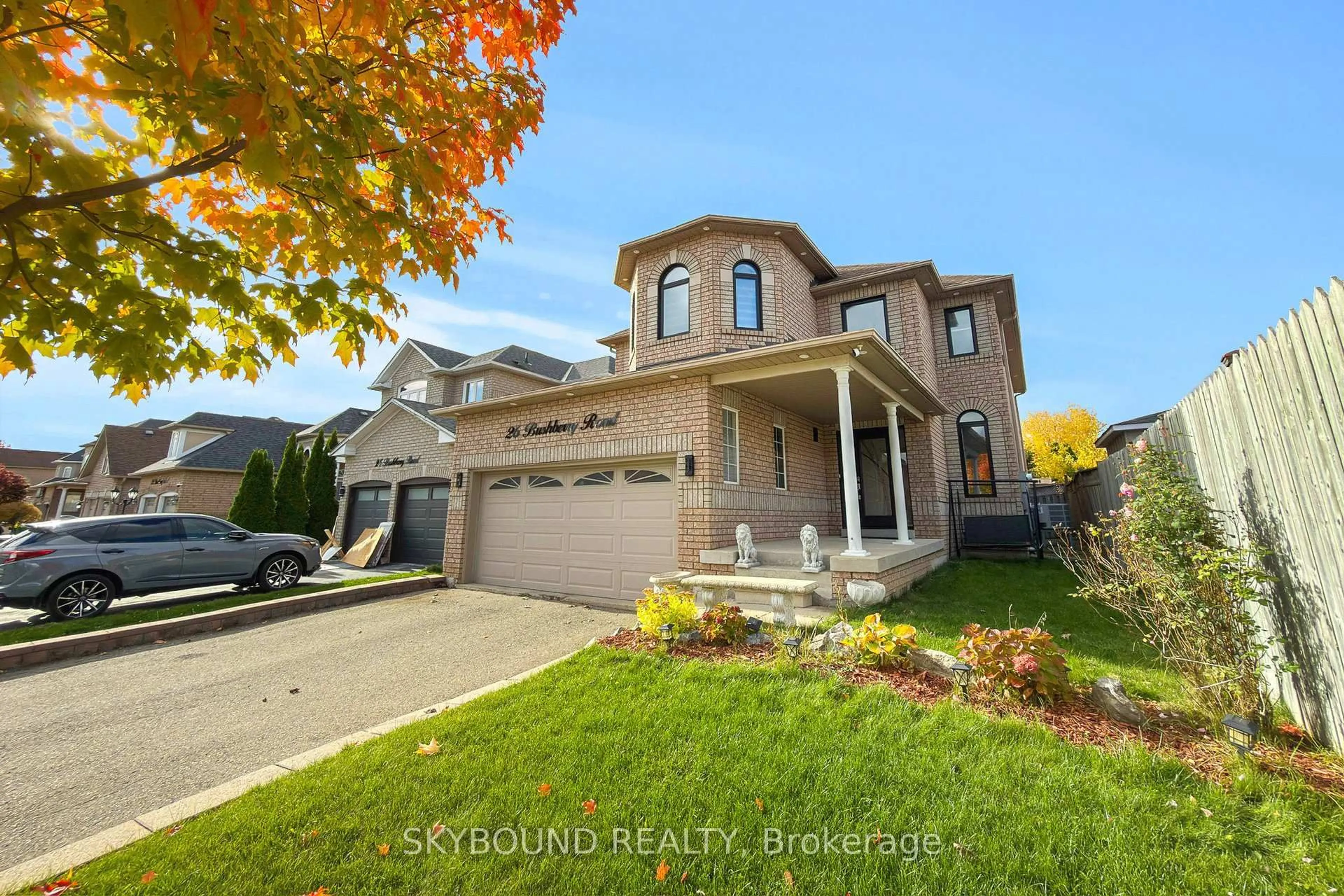 Home with brick exterior material, street for 26 Bushberry Rd, Brampton Ontario L7A 1L3