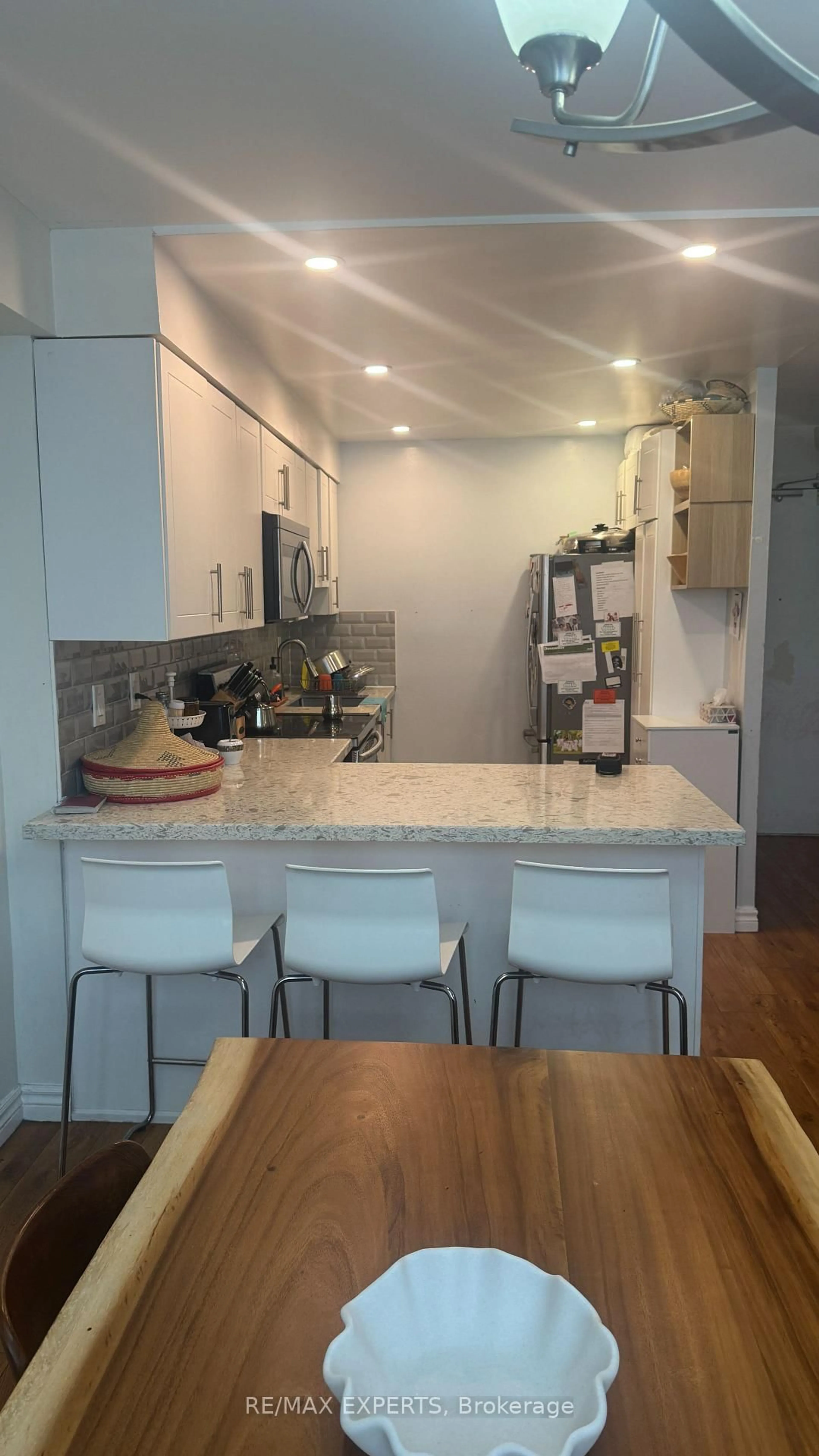 Open concept kitchen, unknown for 100 Lotherton Ptwy #1002, Toronto Ontario M6B 2G8