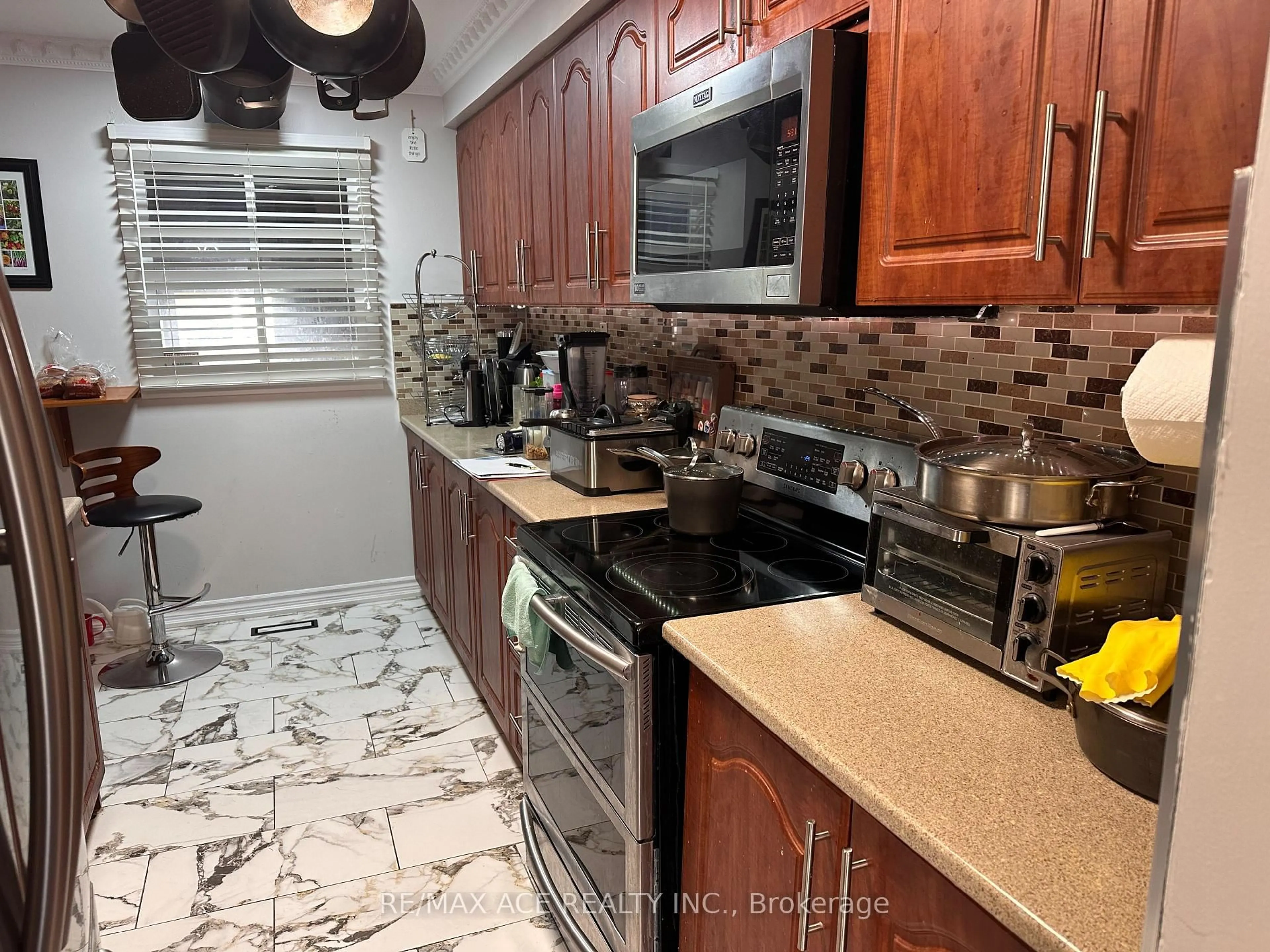 Standard kitchen, ceramic/tile floor for 247 Royal Salisbury Way, Brampton Ontario L6V 3G4