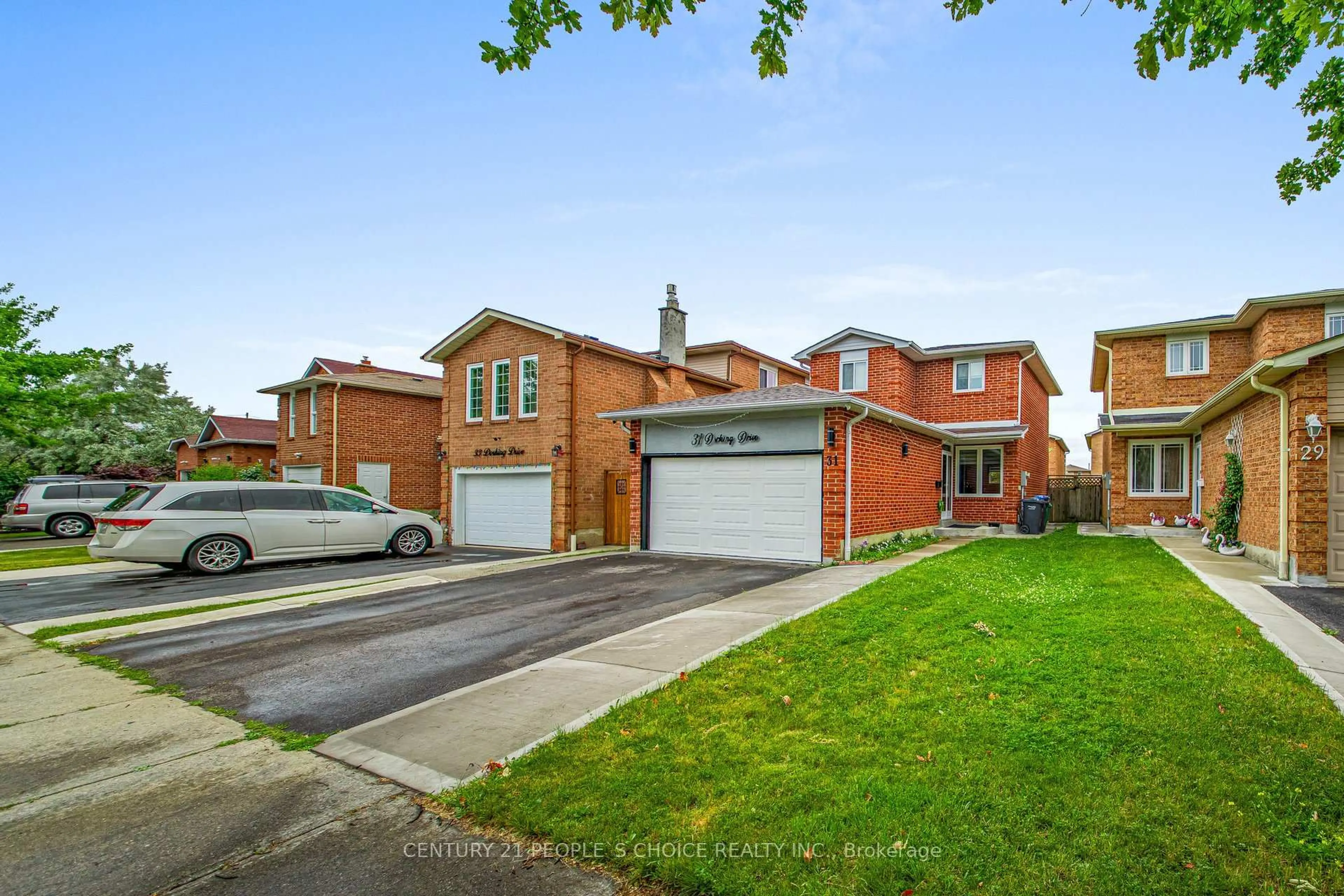 Home with brick exterior material, street for 31 Dorking Dr, Brampton Ontario L6Z 3T9
