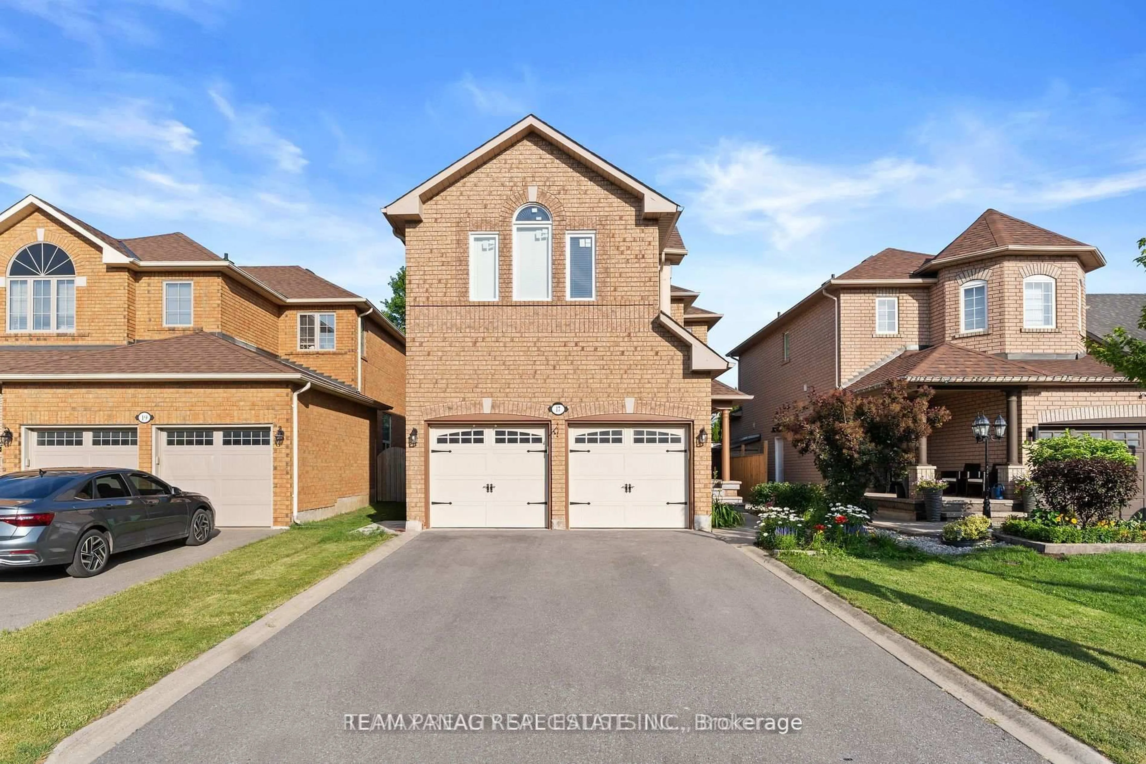 Home with brick exterior material, street for 17 Bushberry Rd, Brampton Ontario L7A 1K4