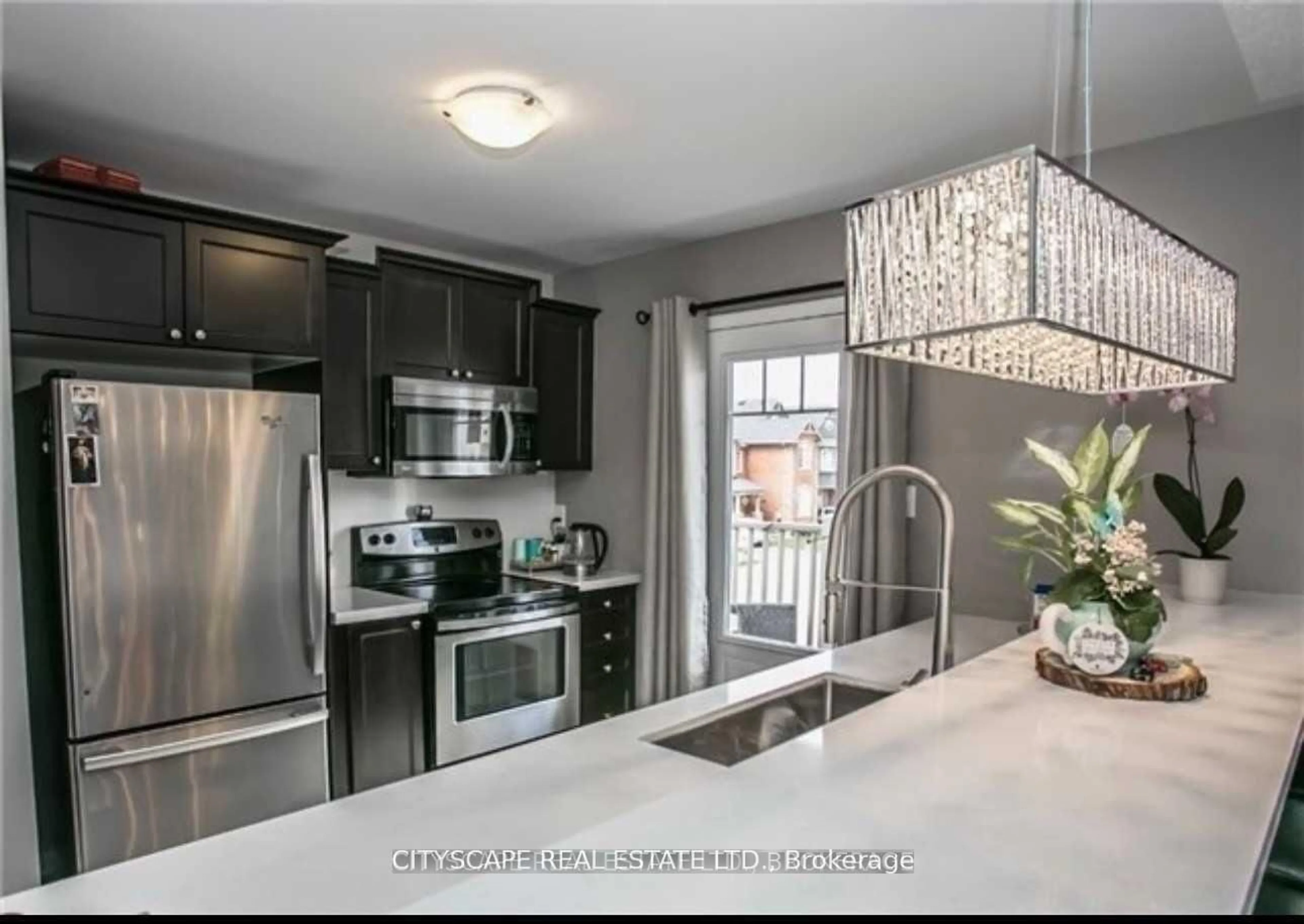 Open concept kitchen, unknown for 1023 Stemman Pl, Milton Ontario L9T 8R1