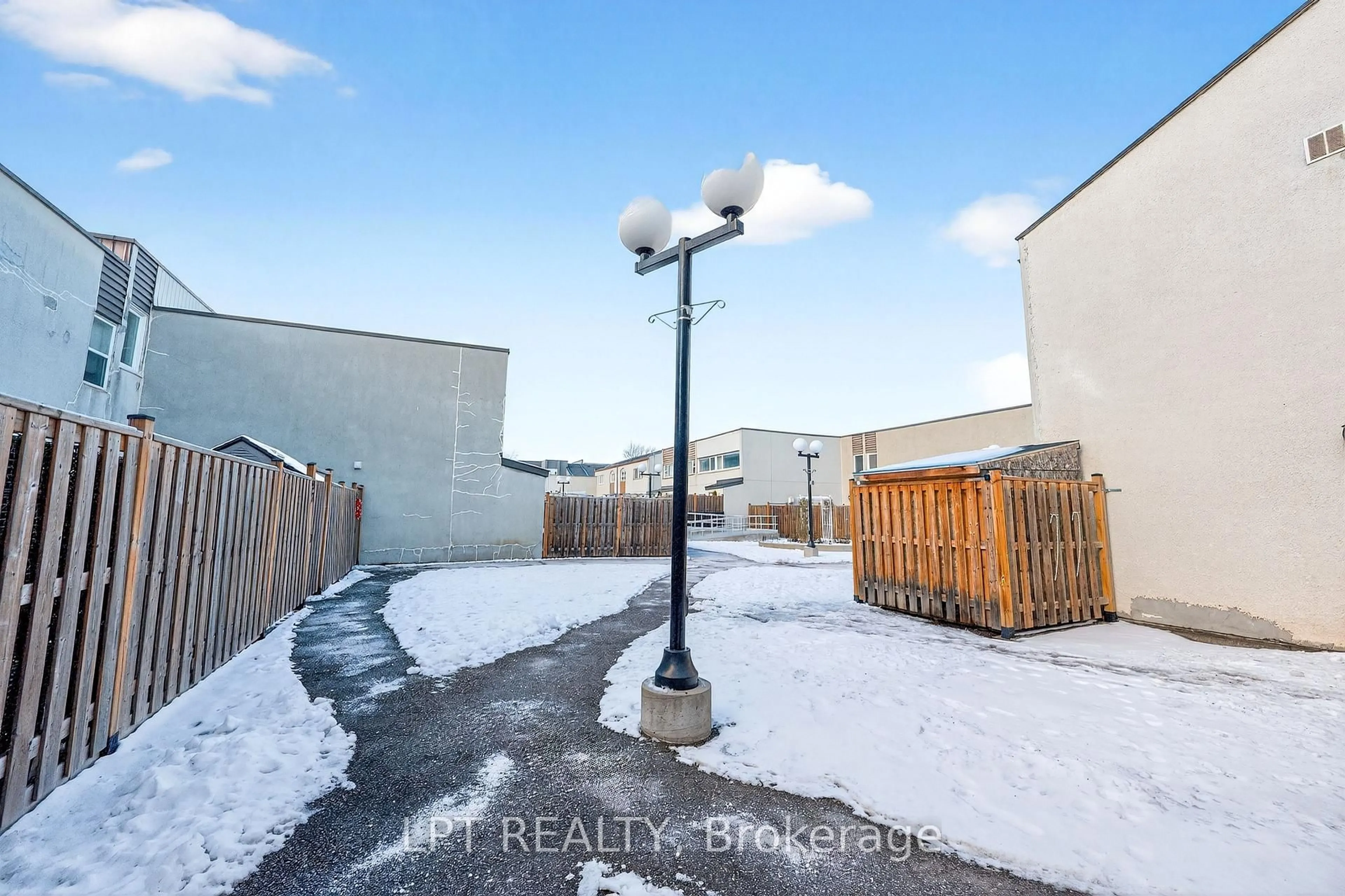 A pic from outside/outdoor area/front of a property/back of a property/a pic from drone, street for 3040 Constitution Blvd #103, Mississauga Ontario L4Y 3X7