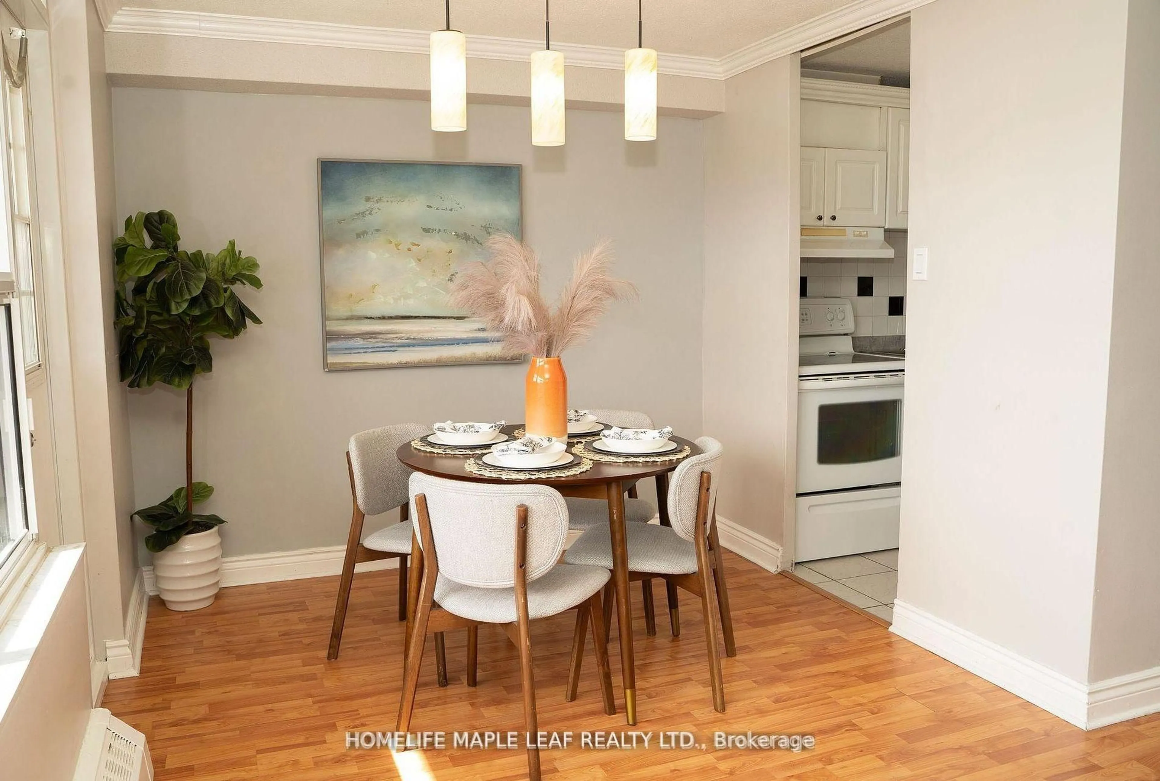 Dining room, wood/laminate floor for 3120 Kirwin Ave #908, Mississauga Ontario L5A 3R2