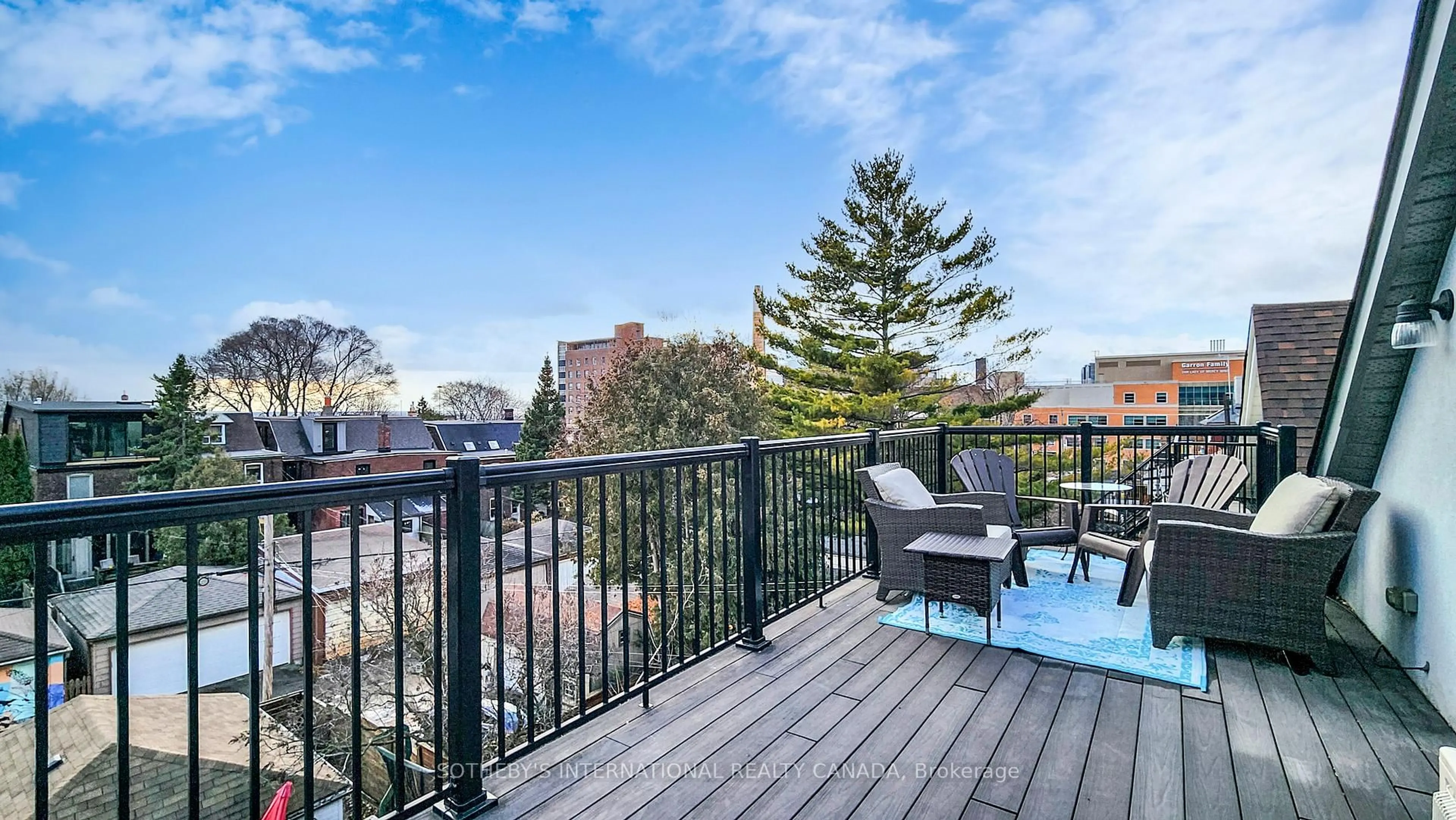 Patio, city buildings view from balcony for 217 Pearson Ave, Toronto Ontario M6R 1G6
