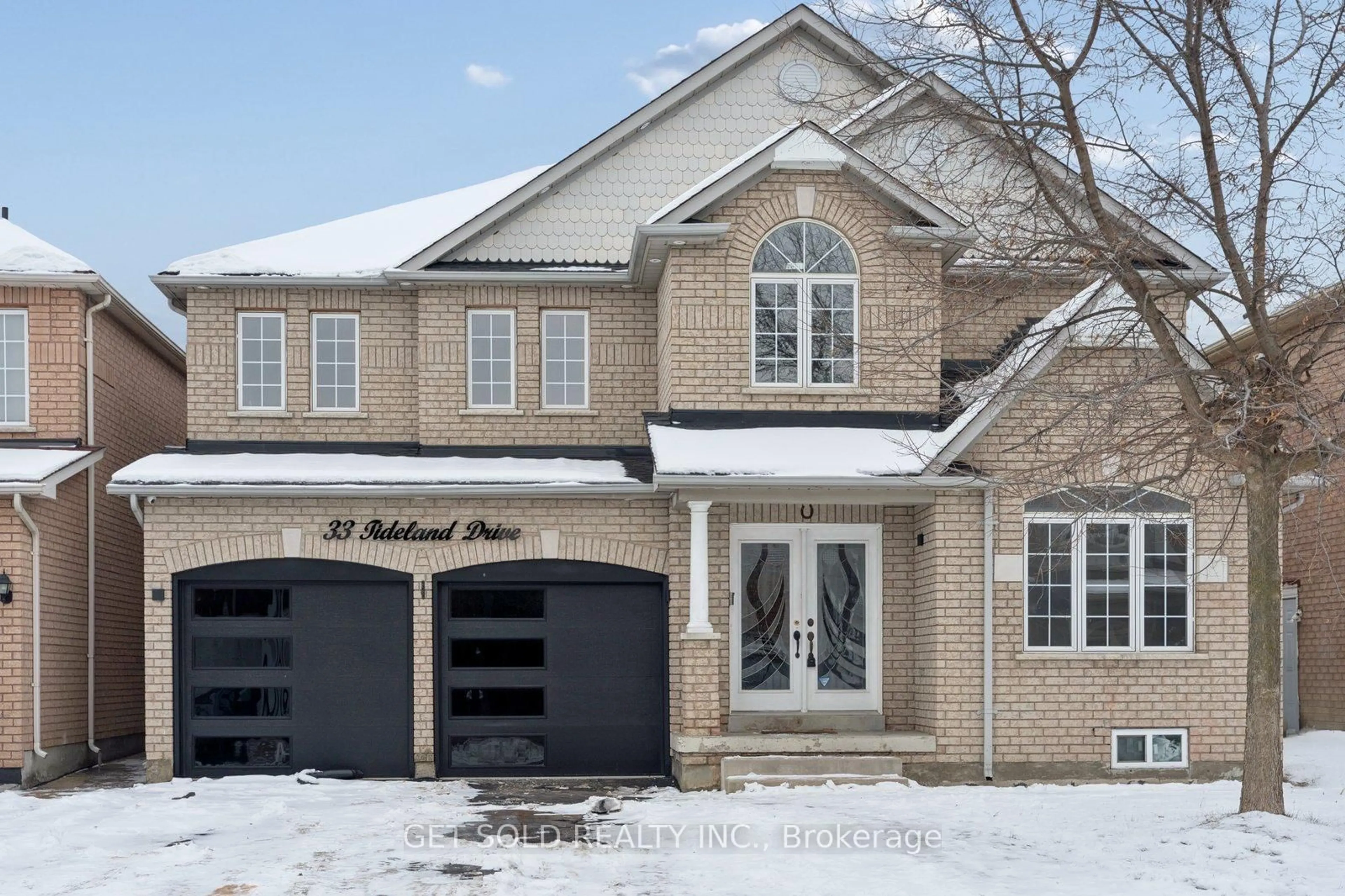 Home with brick exterior material, street for 33 Tideland Dr, Brampton Ontario L7A 2W2