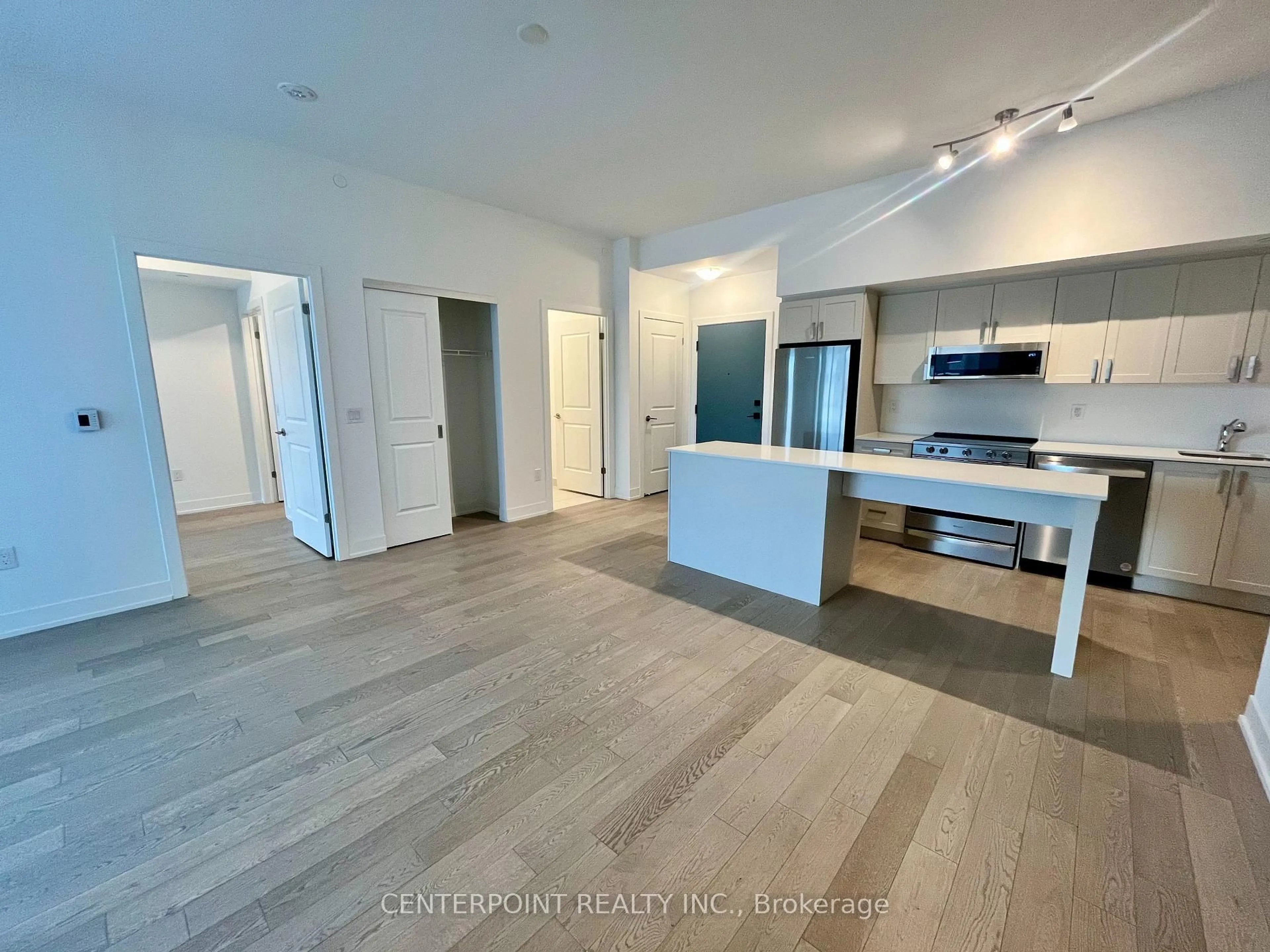 Open concept kitchen, unknown for 1063 Douglas Mccurdy Common #201, Mississauga Ontario L5G 0C5