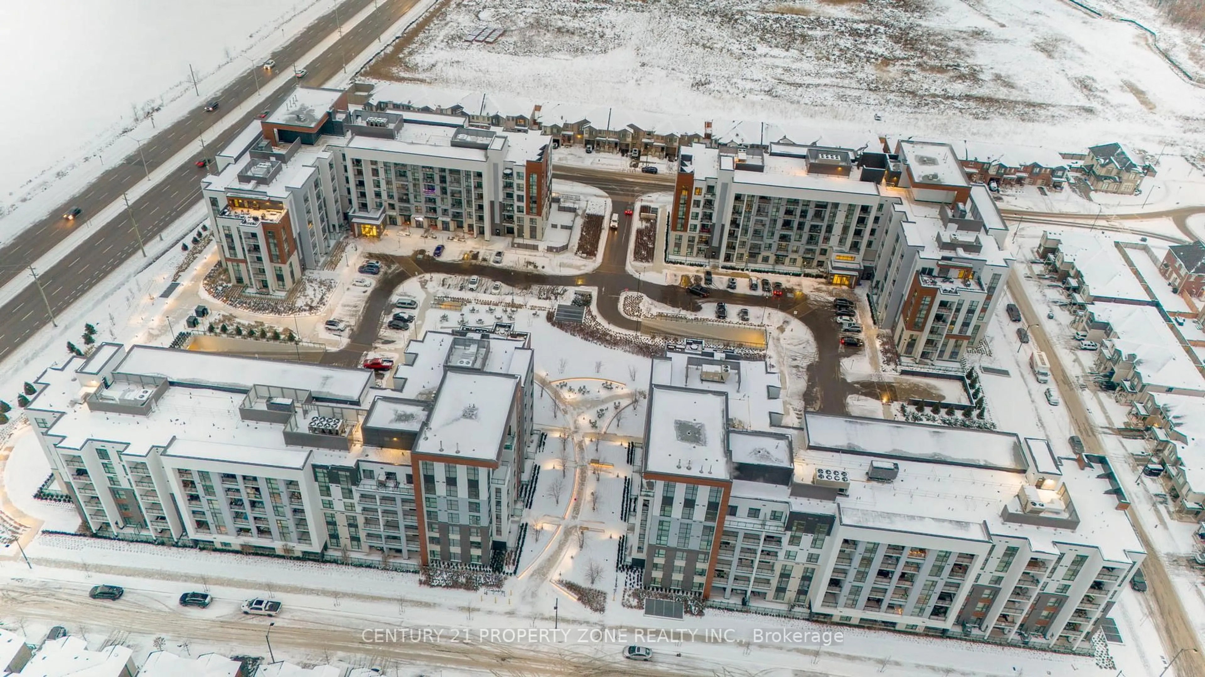 A pic from outside/outdoor area/front of a property/back of a property/a pic from drone, unknown for 460 Gordon Krantz Ave #204, Milton Ontario L9E 1Z2