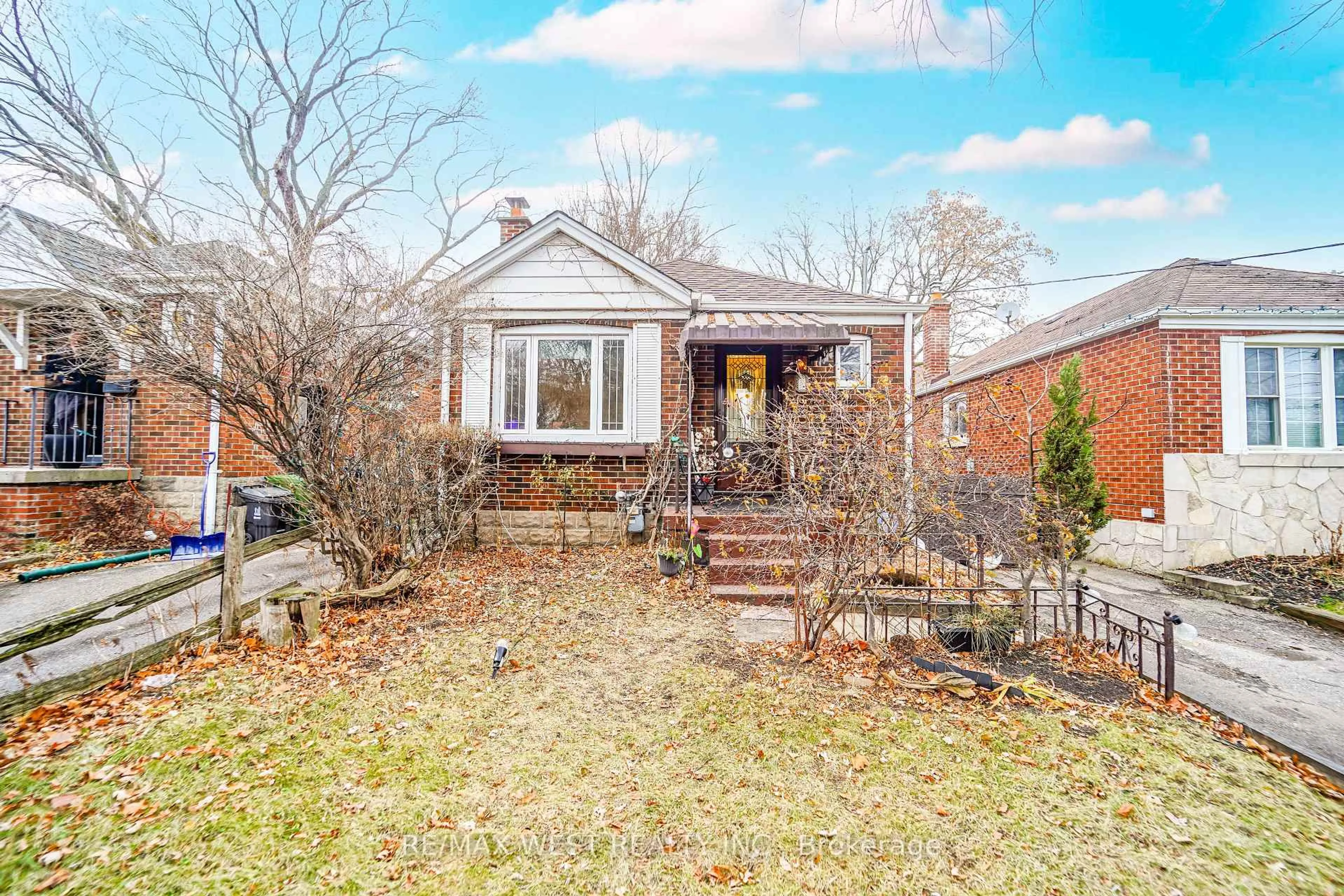 Home with brick exterior material, street for 8 Struthers St, Toronto Ontario M8V 1Y1