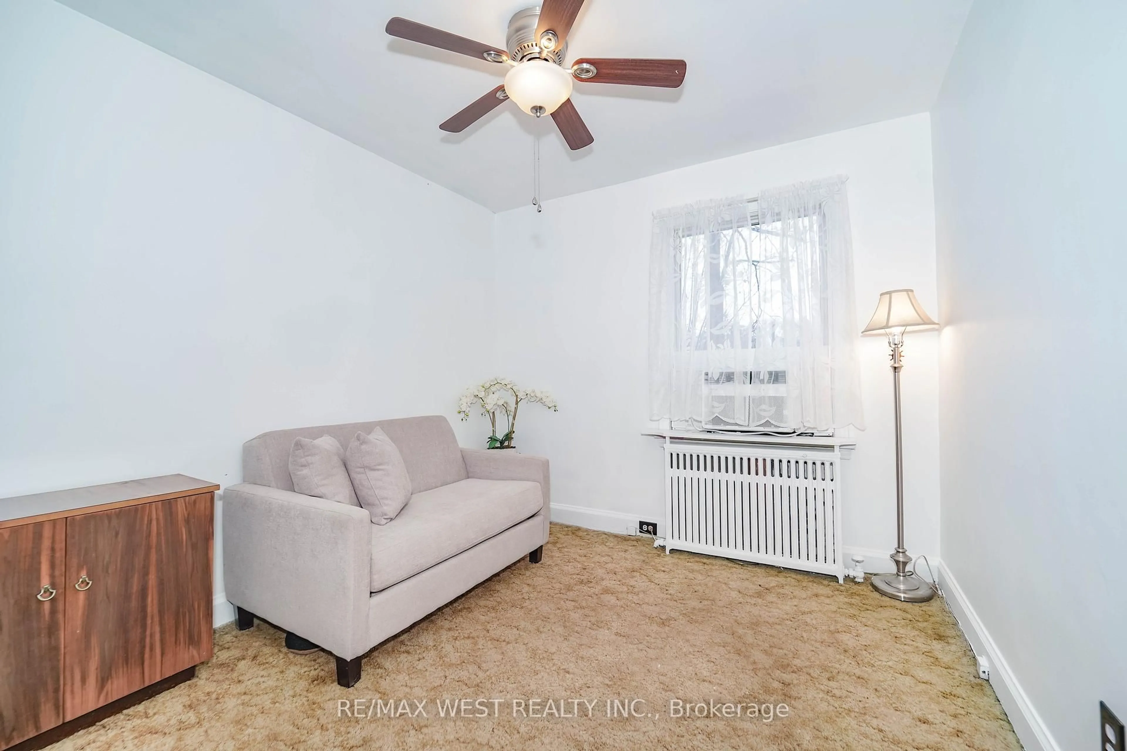 Living room with furniture, unknown for 8 Struthers St, Toronto Ontario M8V 1Y1