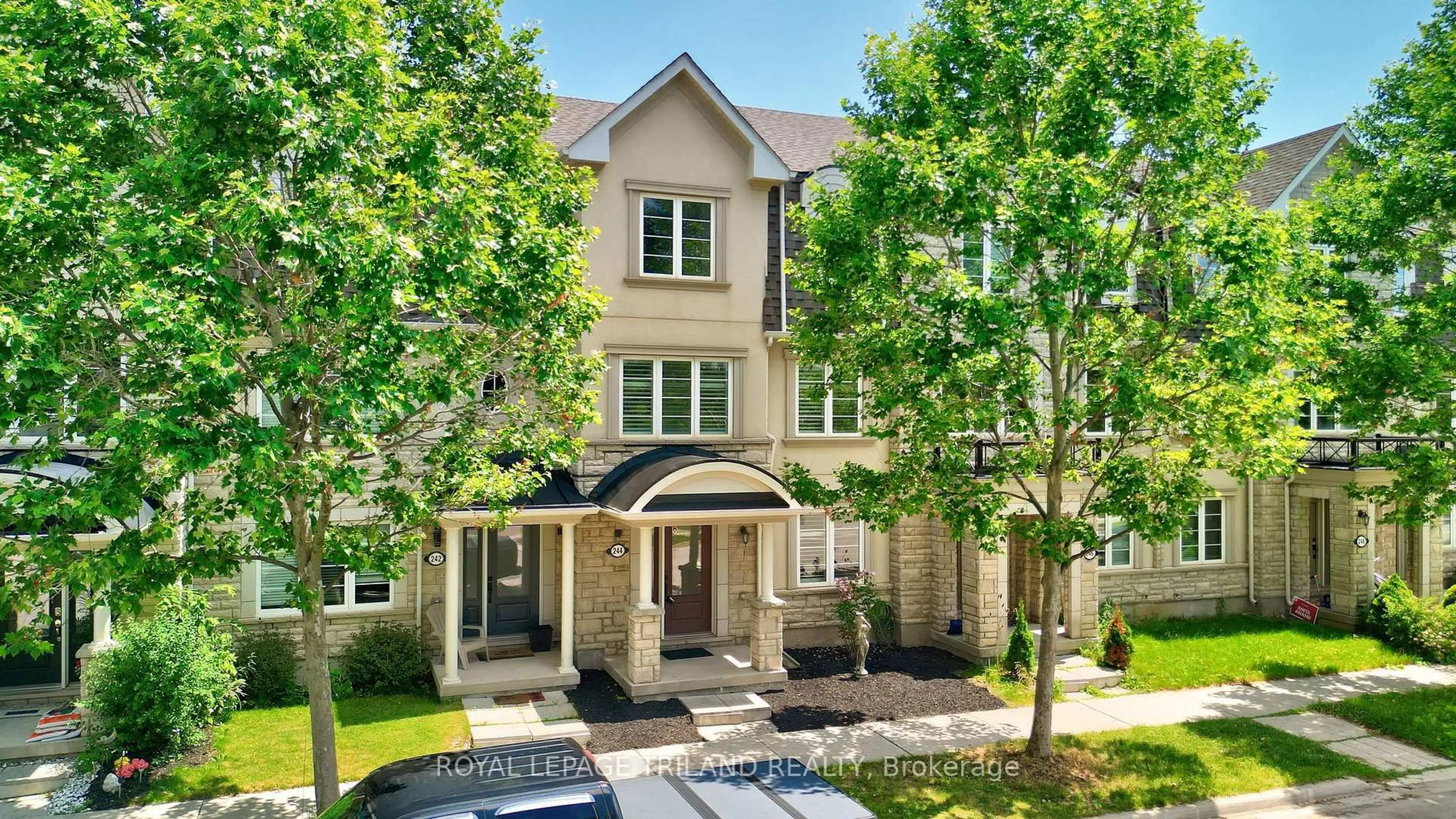 Home with brick exterior material, street for 244 Ellen Davidson Dr, Oakville Ontario L6M 0V2