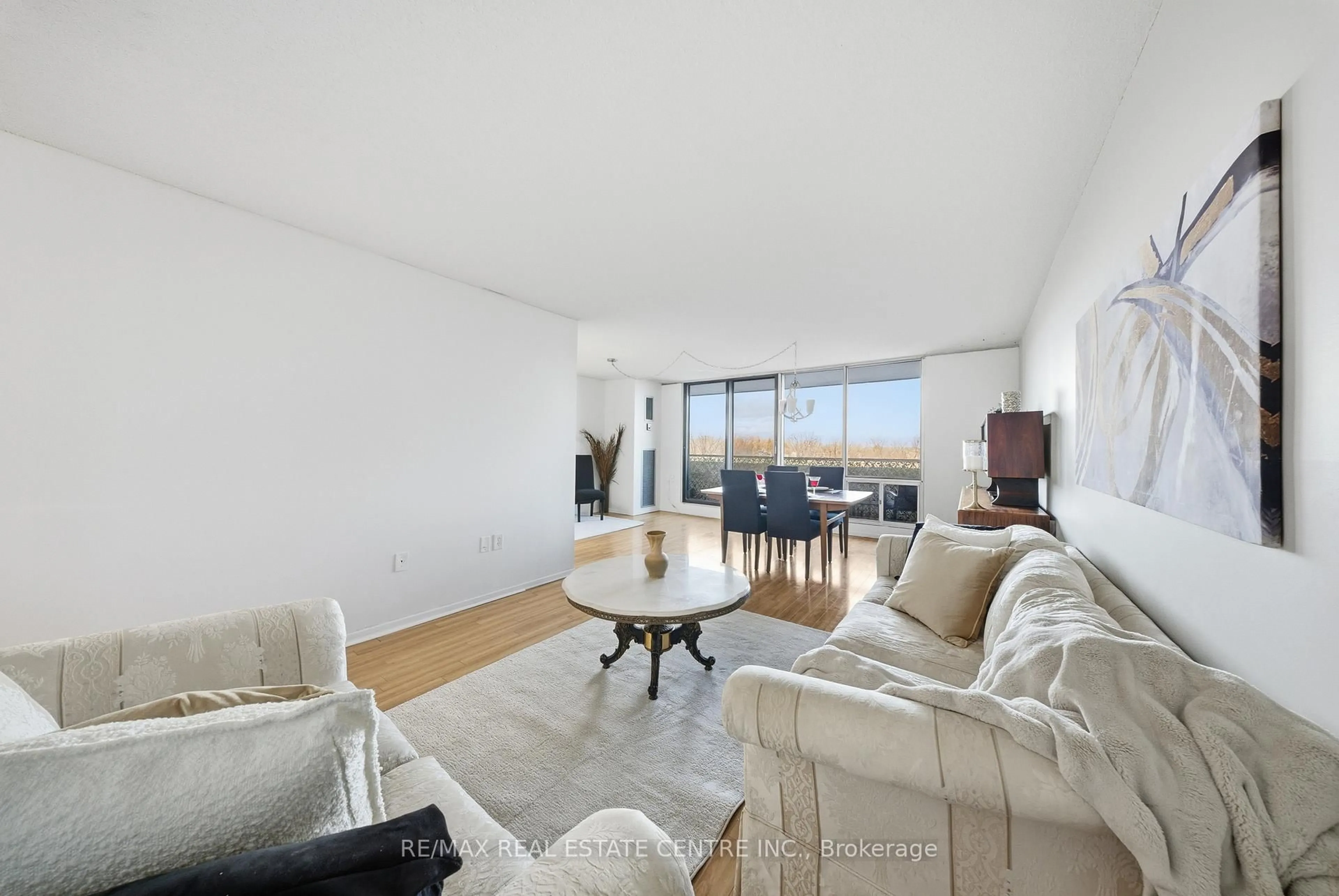 Living room with furniture, unknown for 2055 Upper Middle Rd #602, Burlington Ontario L7P 3P4