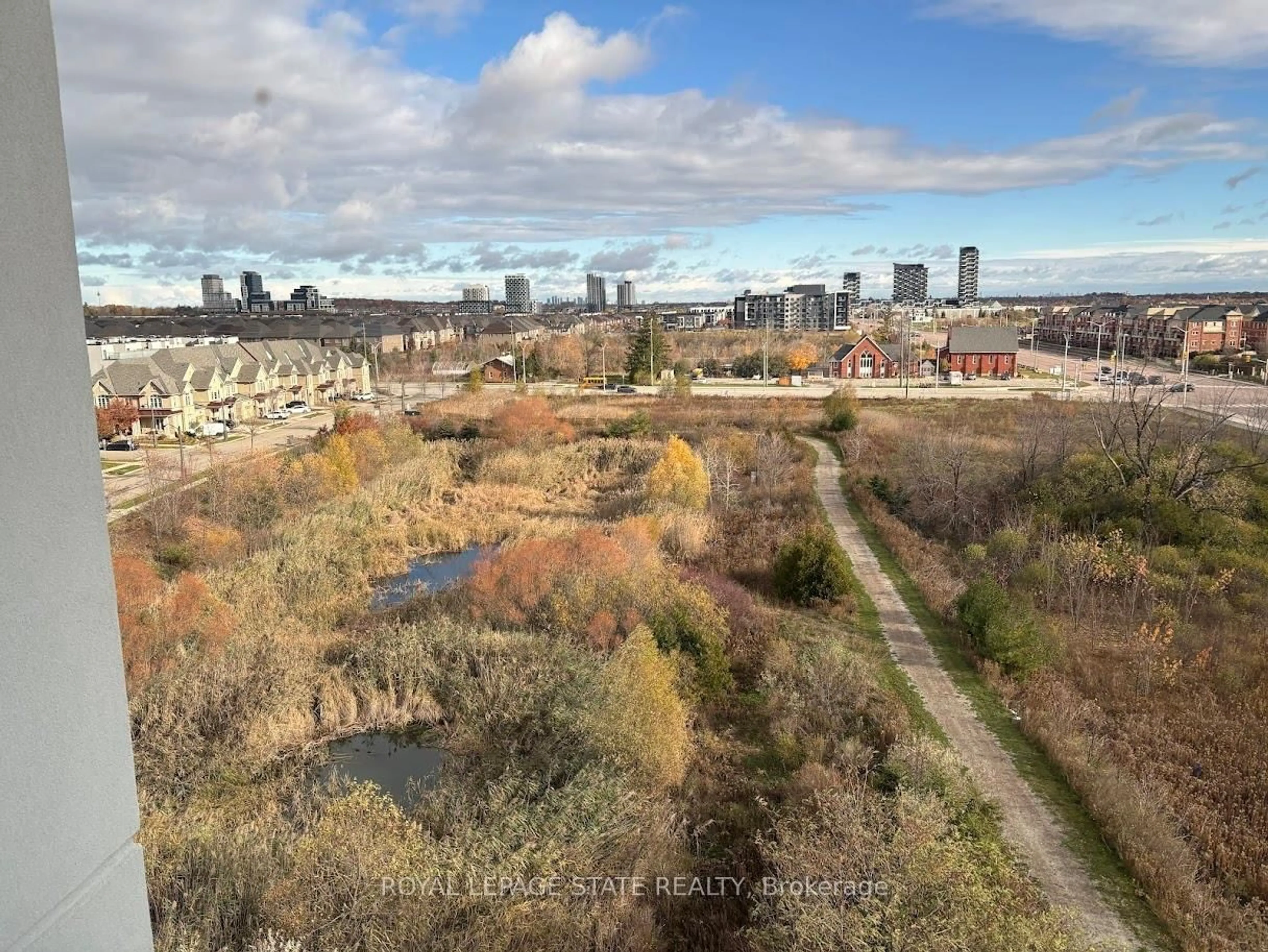 A pic from outside/outdoor area/front of a property/back of a property/a pic from drone, city buildings view from balcony for 50 Kaitting Tr #610, Oakville Ontario L6M 5N3