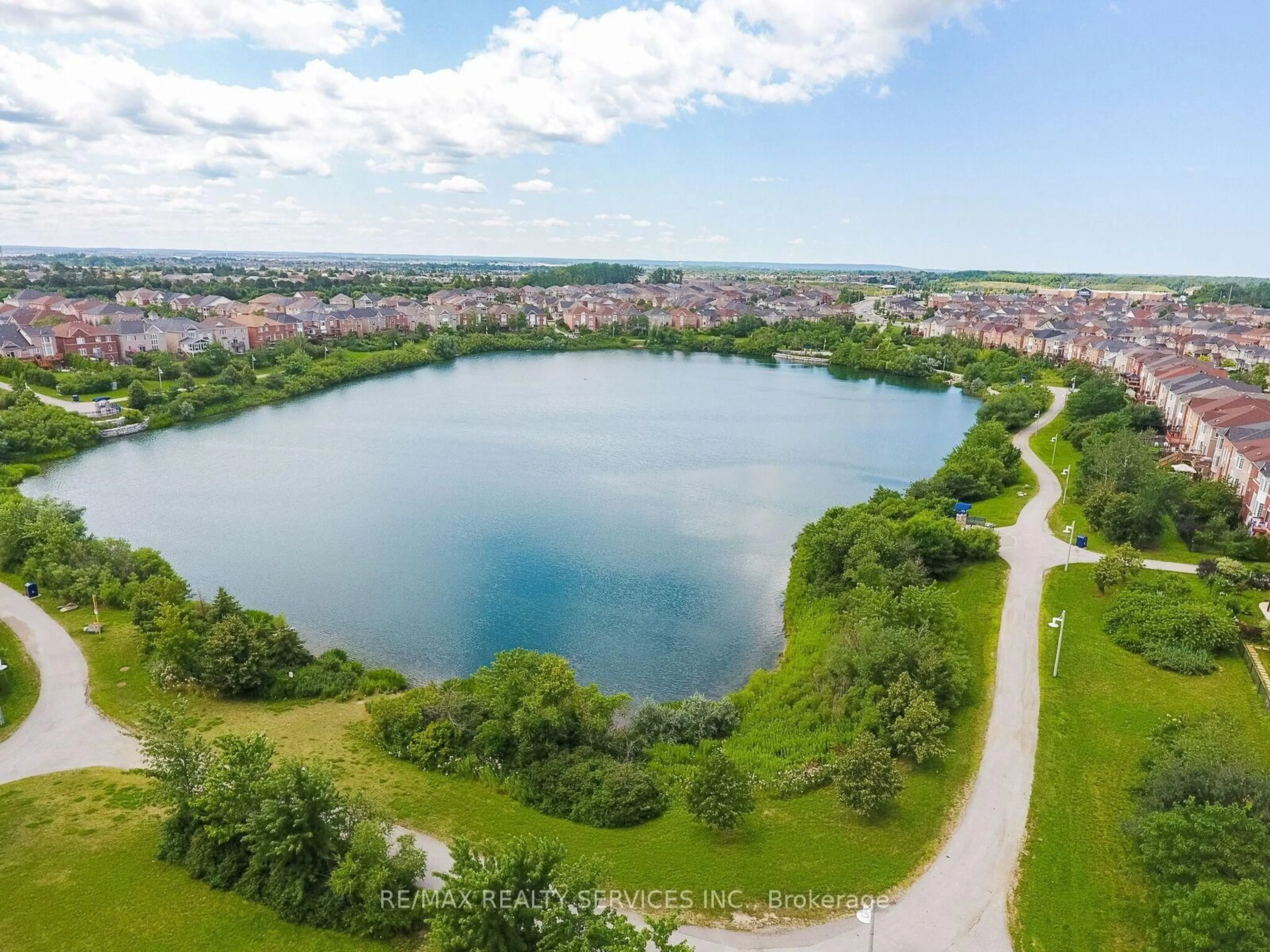 A pic from outside/outdoor area/front of a property/back of a property/a pic from drone, water/lake/river/ocean view for 31 Seahorse Ave, Brampton Ontario L6V 4N7