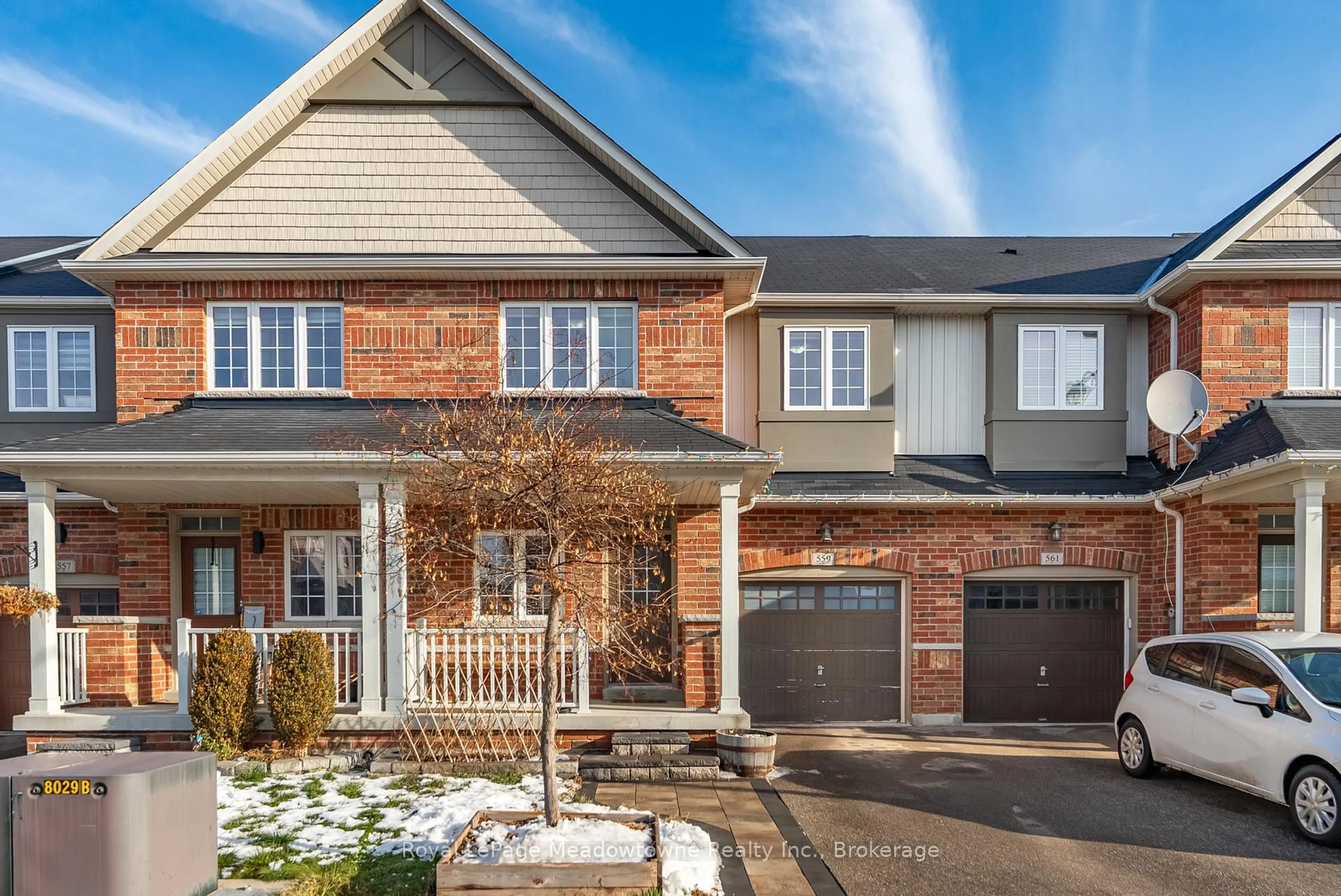 Home with brick exterior material, street for 559 Murray Meadows Pl, Milton Ontario L9T 8L8
