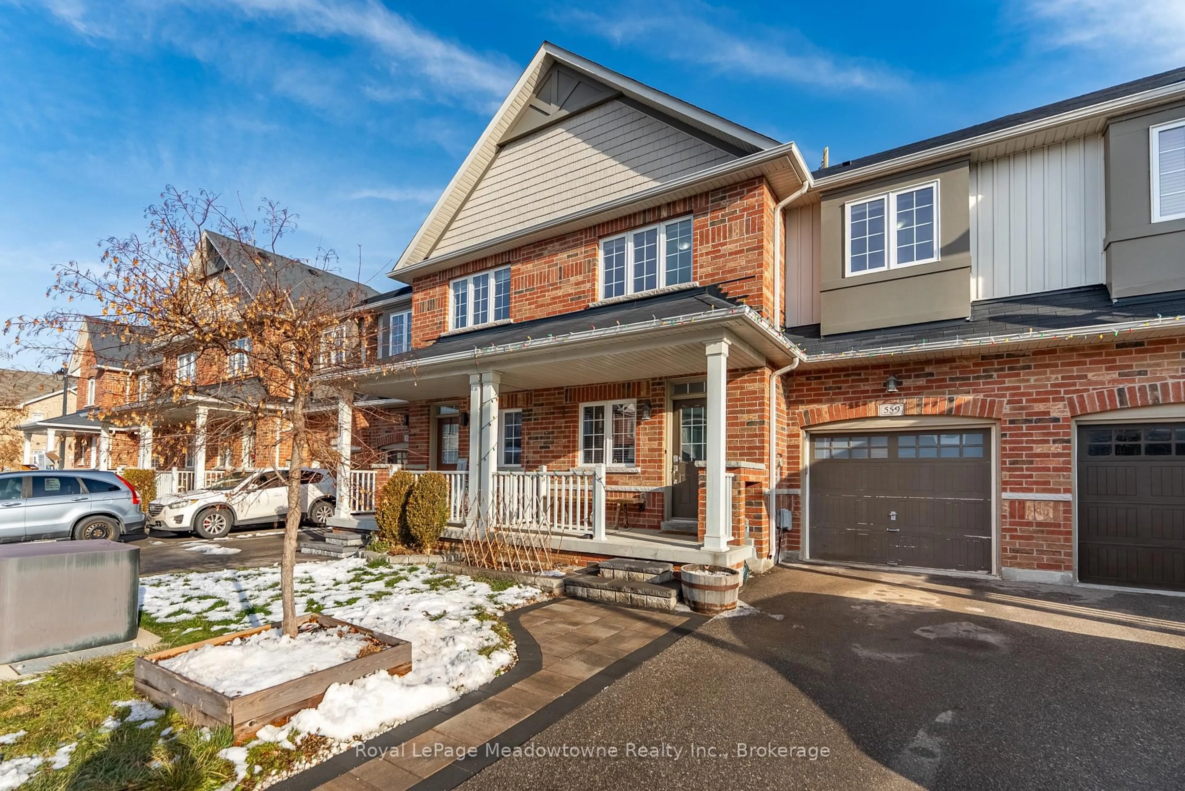 Home with brick exterior material, street for 559 Murray Meadows Pl, Milton Ontario L9T 8L8