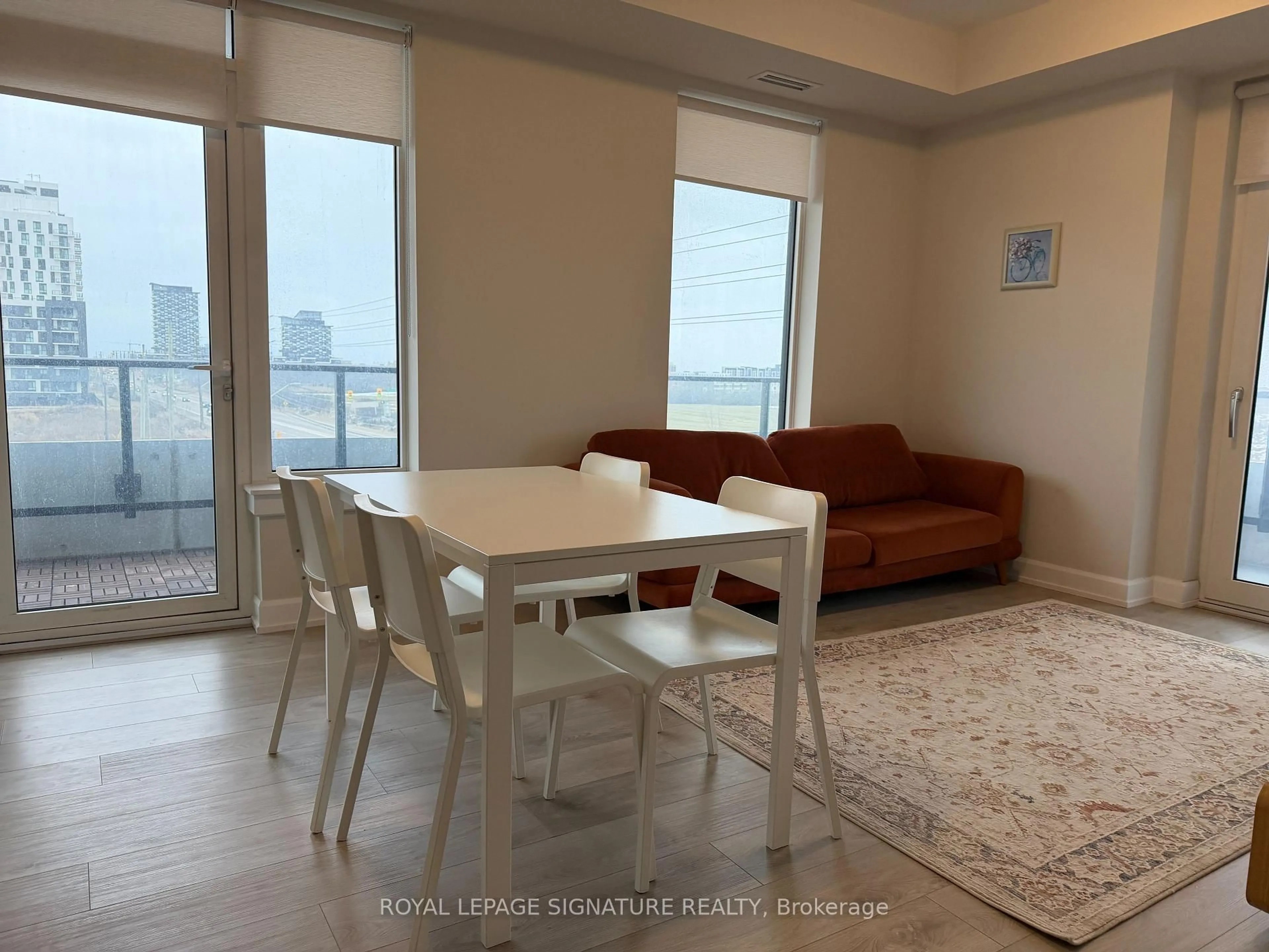 Living room with furniture, unknown for 3200 William Coltson Ave #316, Oakville Ontario L6H 7W6