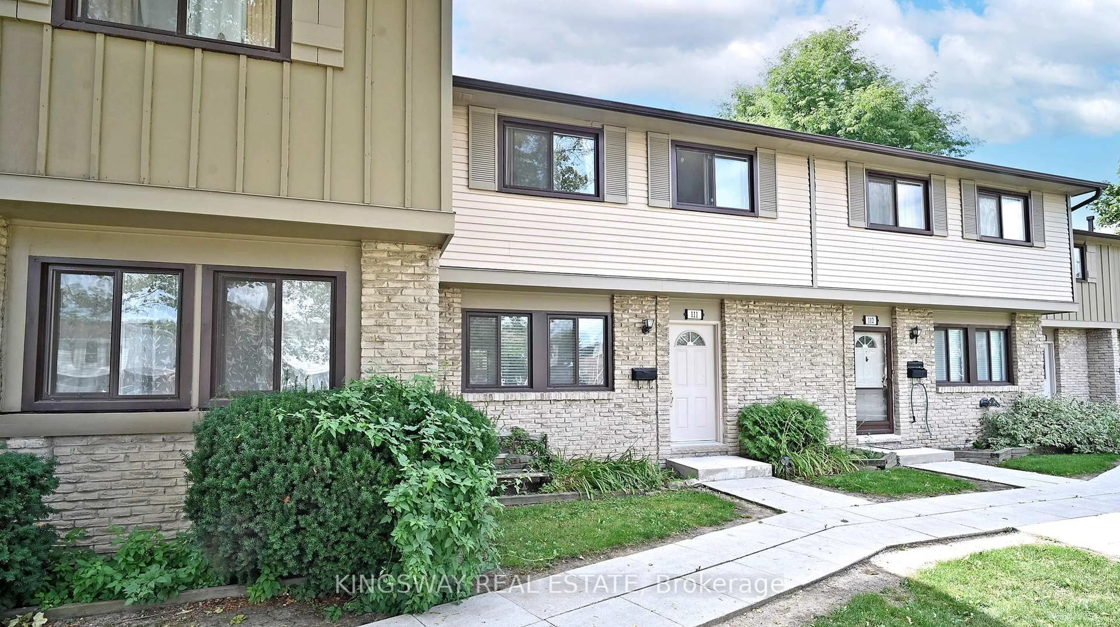 Home with brick exterior material, street for 105 Hansen Rd #111, Brampton Ontario L6V 3C9