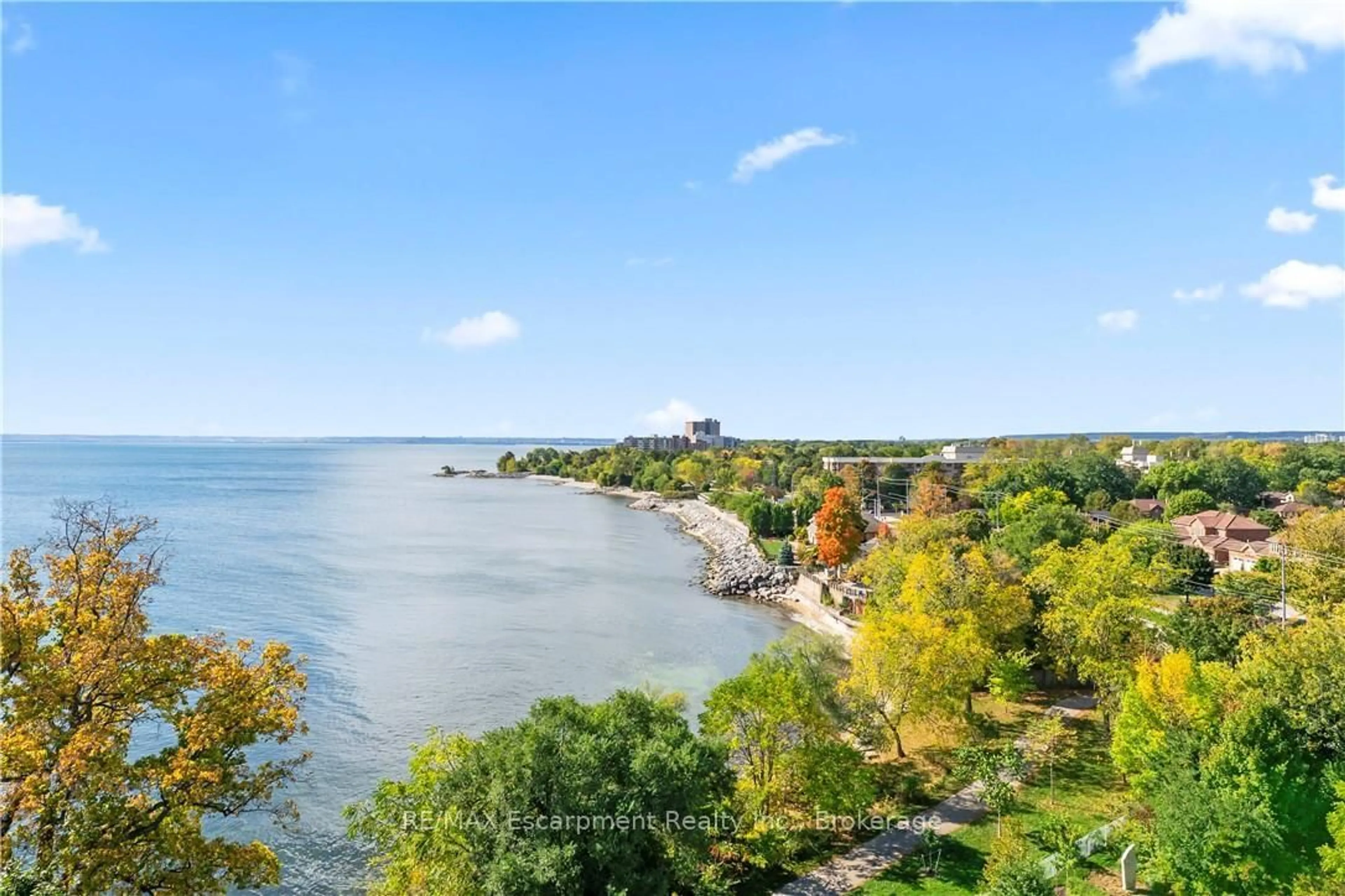 A pic from outside/outdoor area/front of a property/back of a property/a pic from drone, water/lake/river/ocean view for 3500 Lakeshore Rd #827, Oakville Ontario L6L 0B4