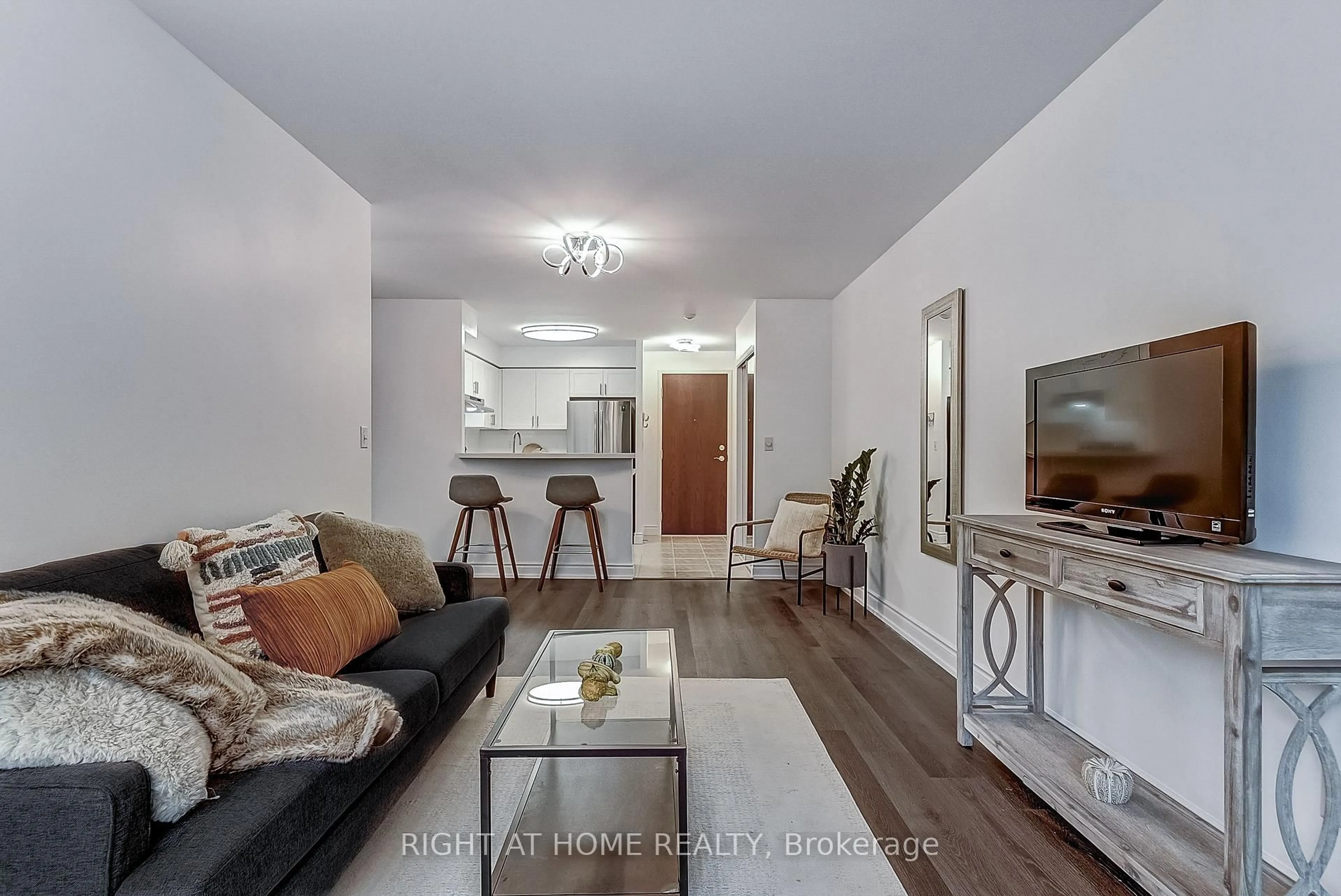 Living room with furniture, unknown for 2565 Erin Centre Blvd #508, Mississauga Ontario L5M 6Z8