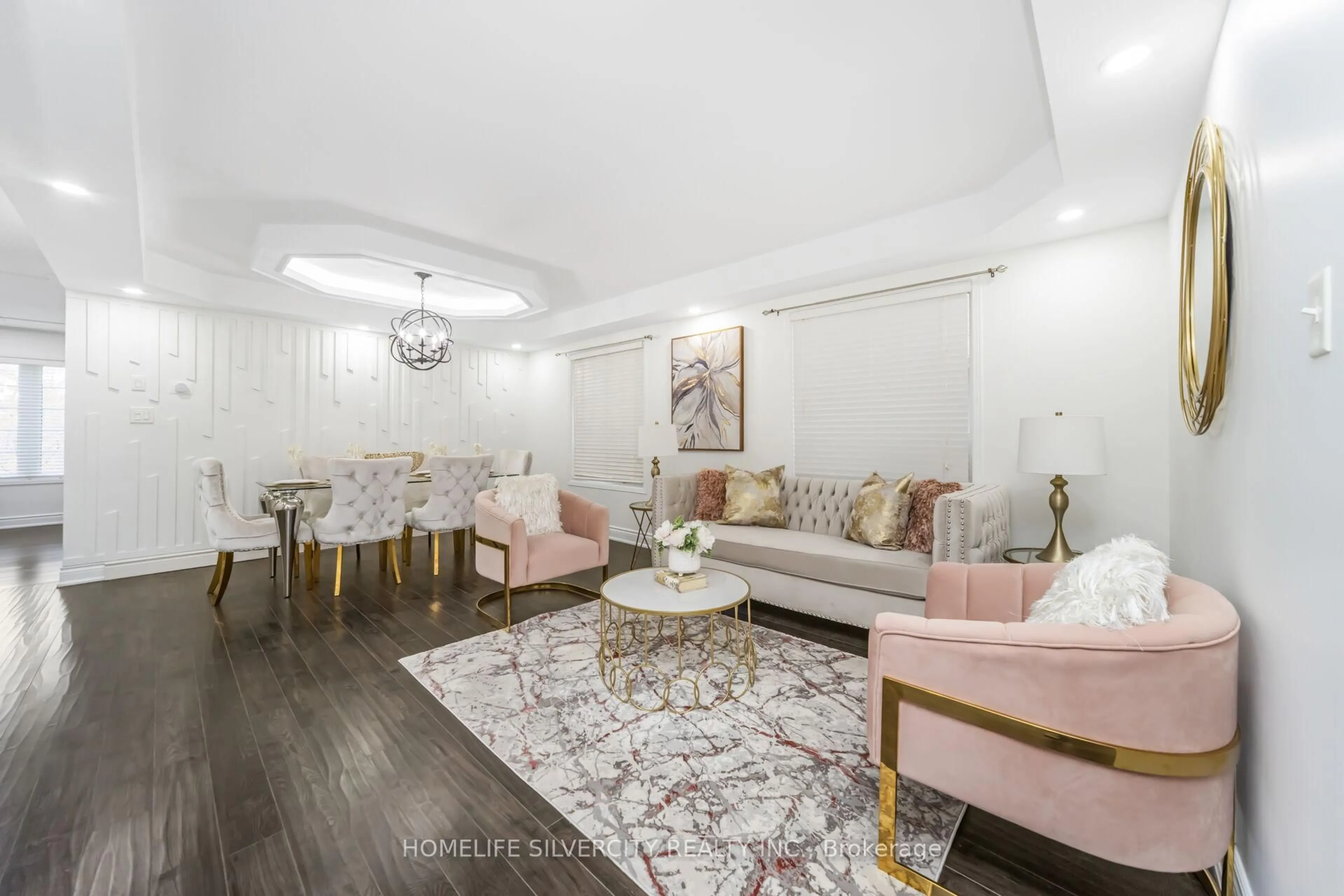 Living room with furniture, wood/laminate floor for 42 Avalanche Cres, Brampton Ontario L6P 1M5