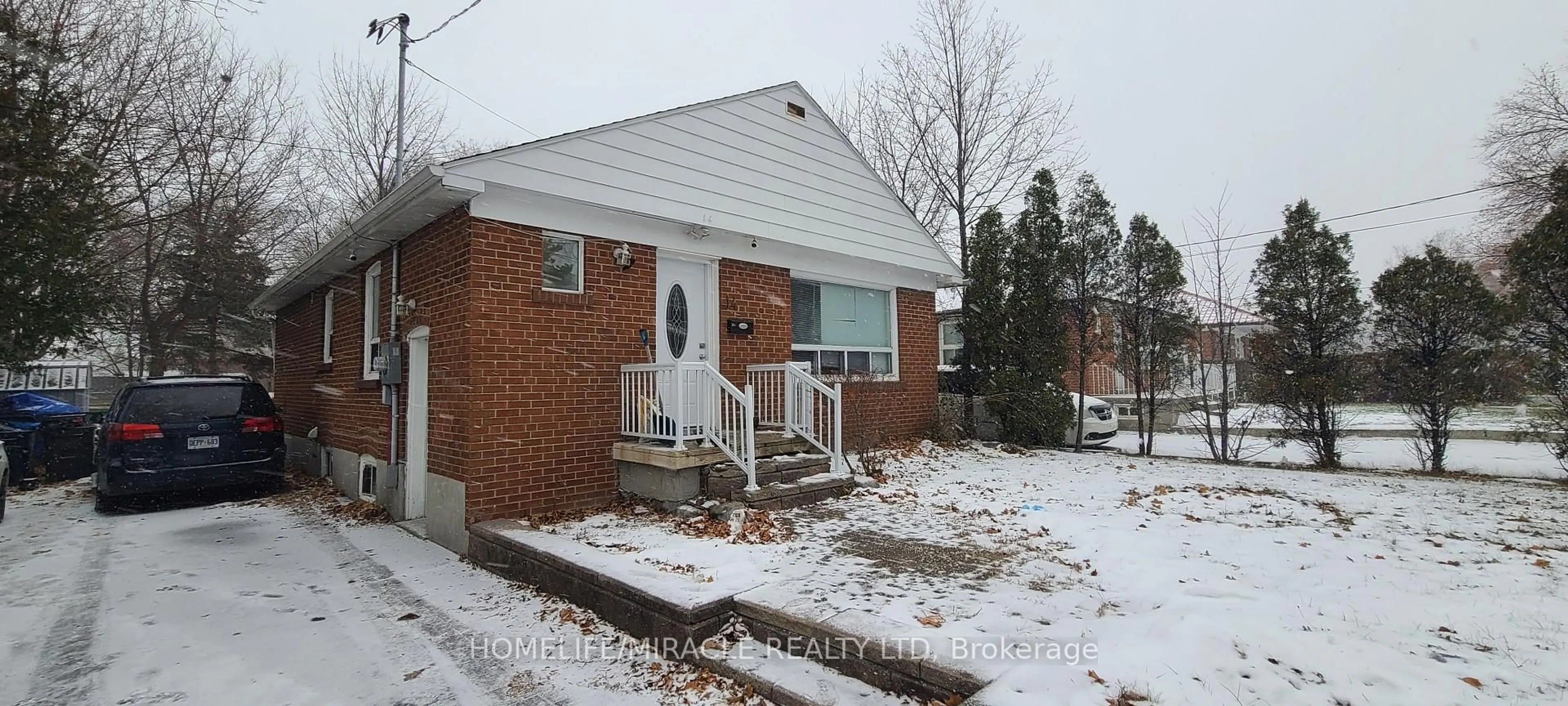 Home with brick exterior material, street for 14 Dallner Rd, Toronto Ontario M3L 1J7
