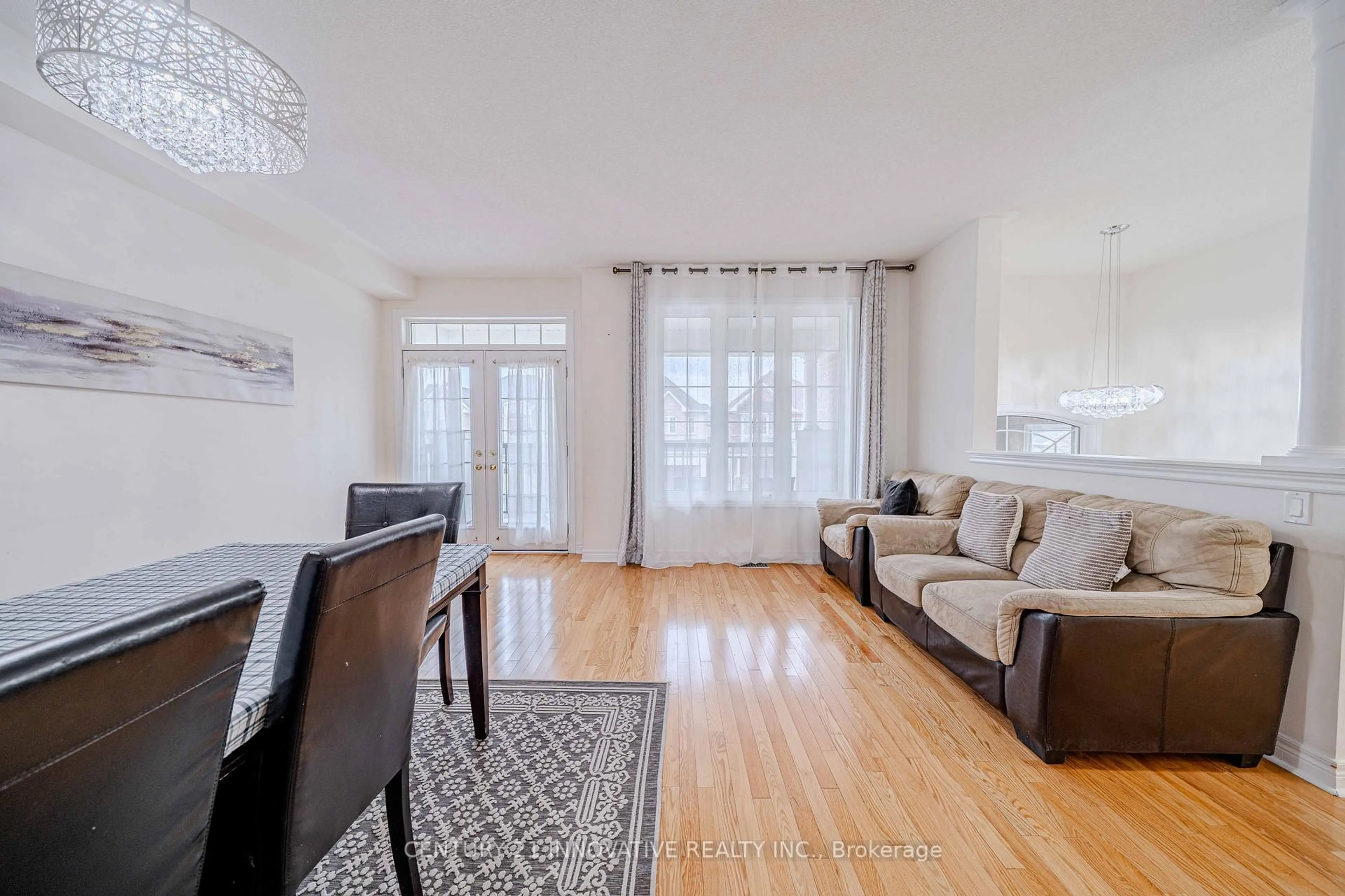 Living room with furniture, wood/laminate floor for 50 Everingham Circ, Brampton Ontario L6R 0R7