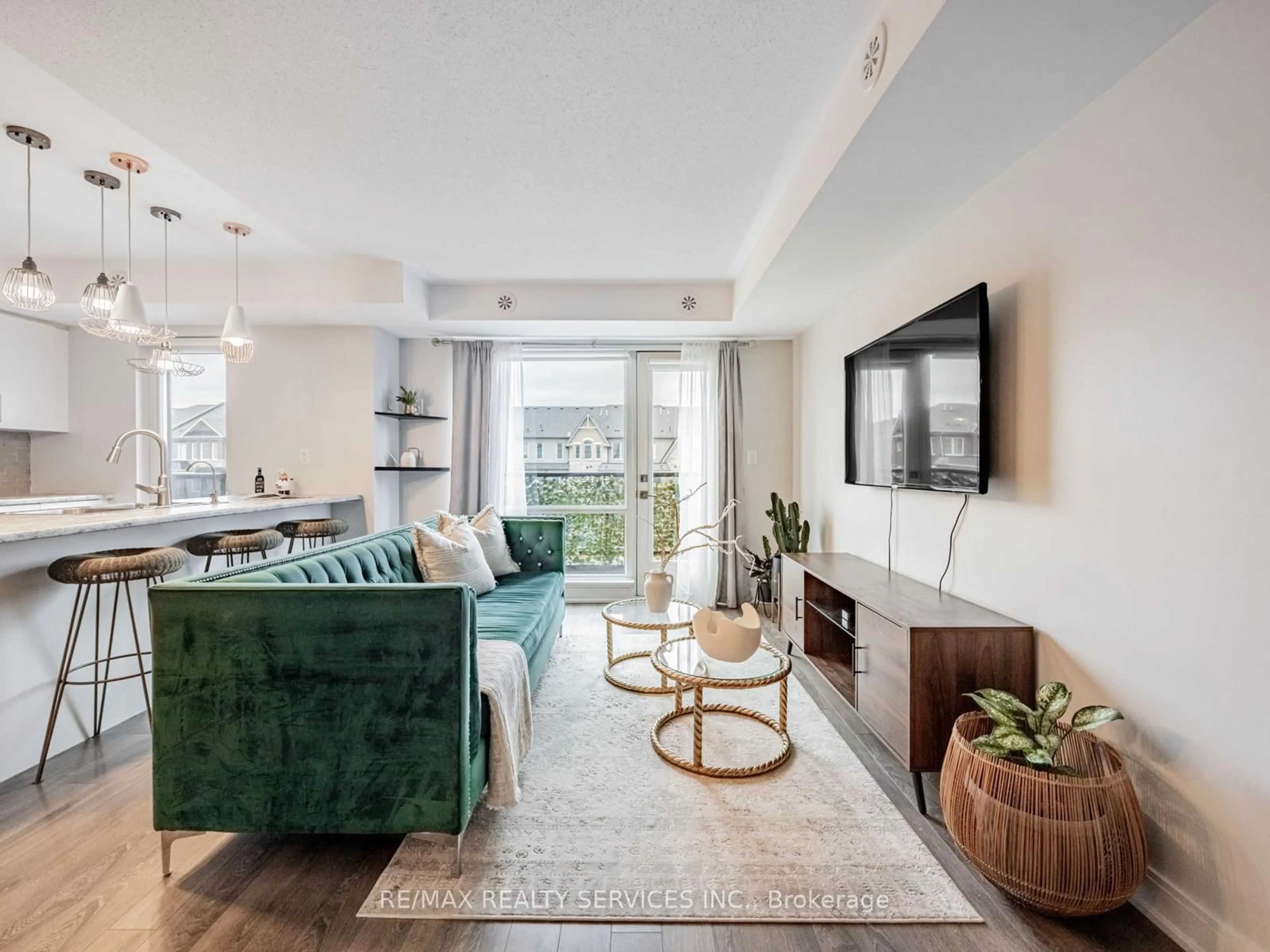 Living room with furniture, unknown for 100 Dufay Rd #60, Brampton Ontario L7A 4S3