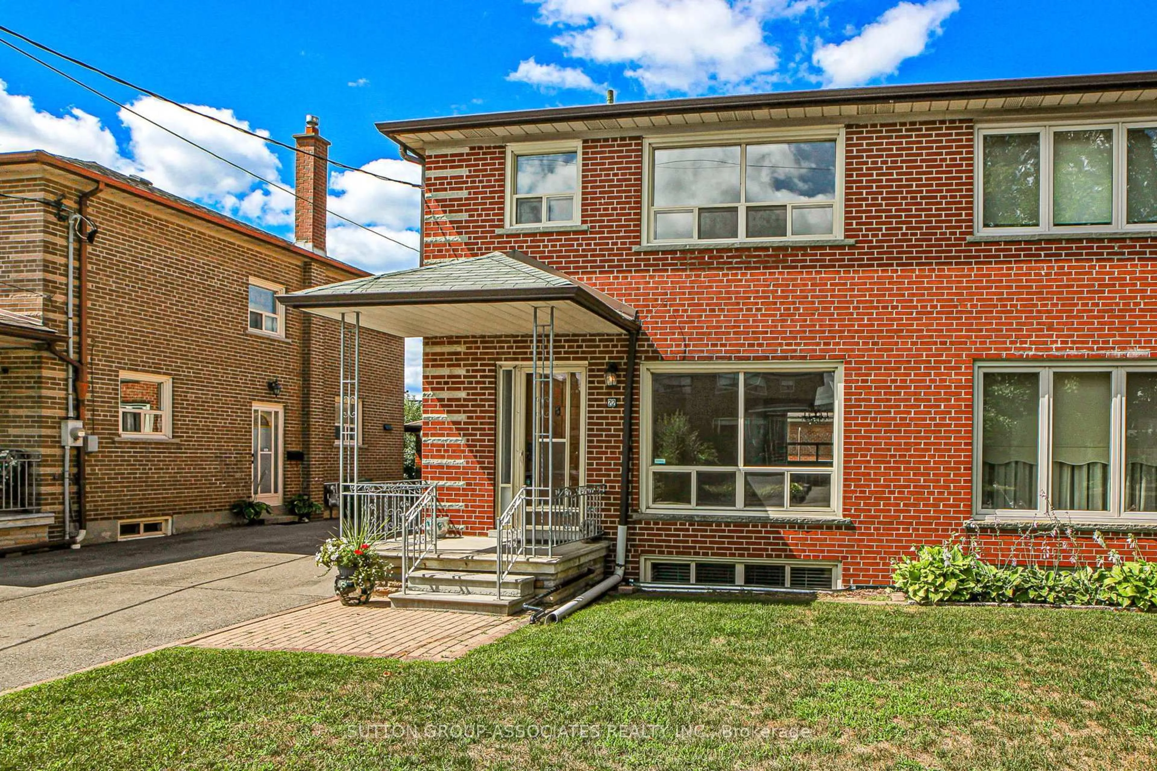 Home with brick exterior material, street for 22 Woodenhill Crt, Toronto Ontario M6M 1K9