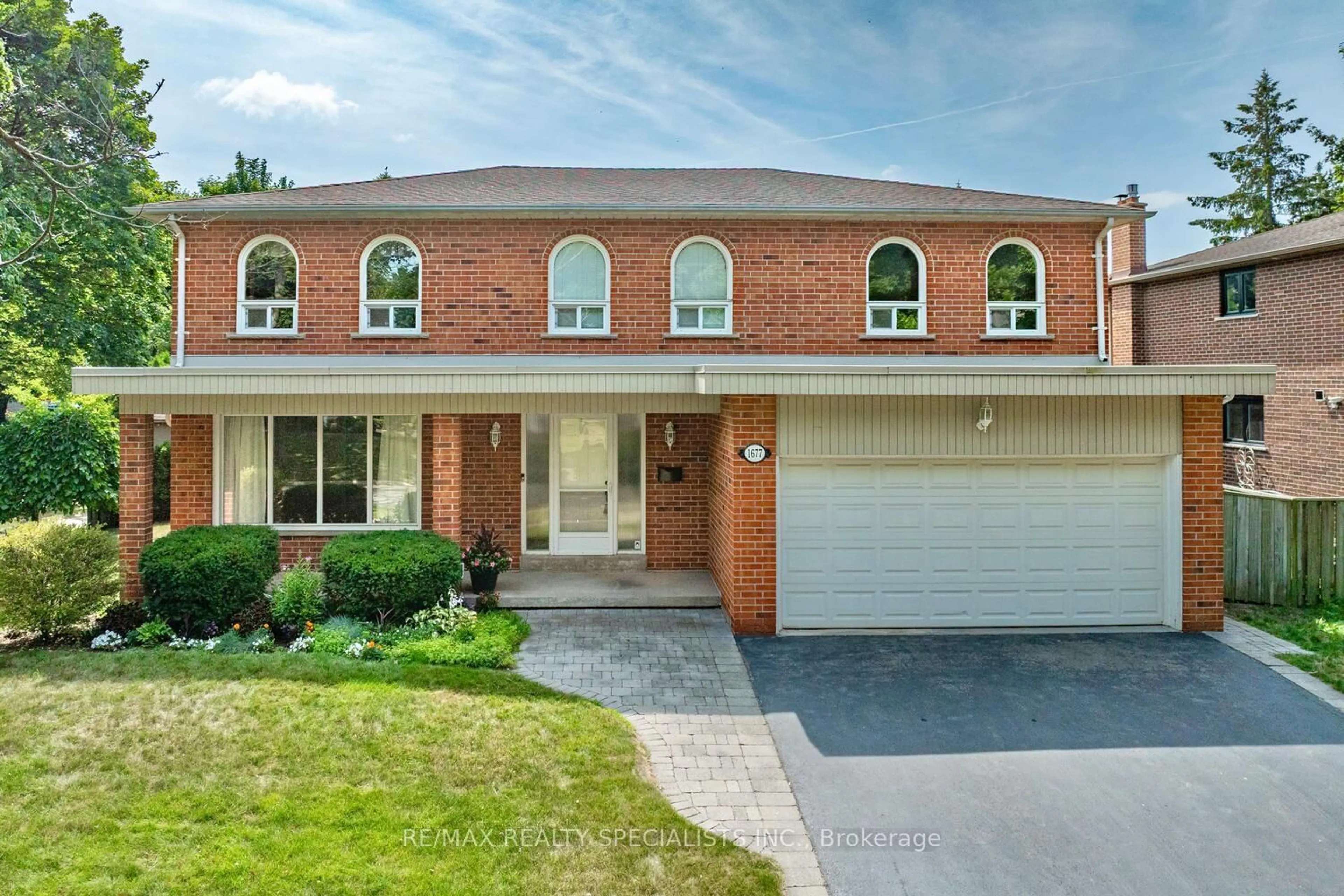 Home with brick exterior material, street for 1677 Sherwood Forrest Circ, Mississauga Ontario L5K 2G8