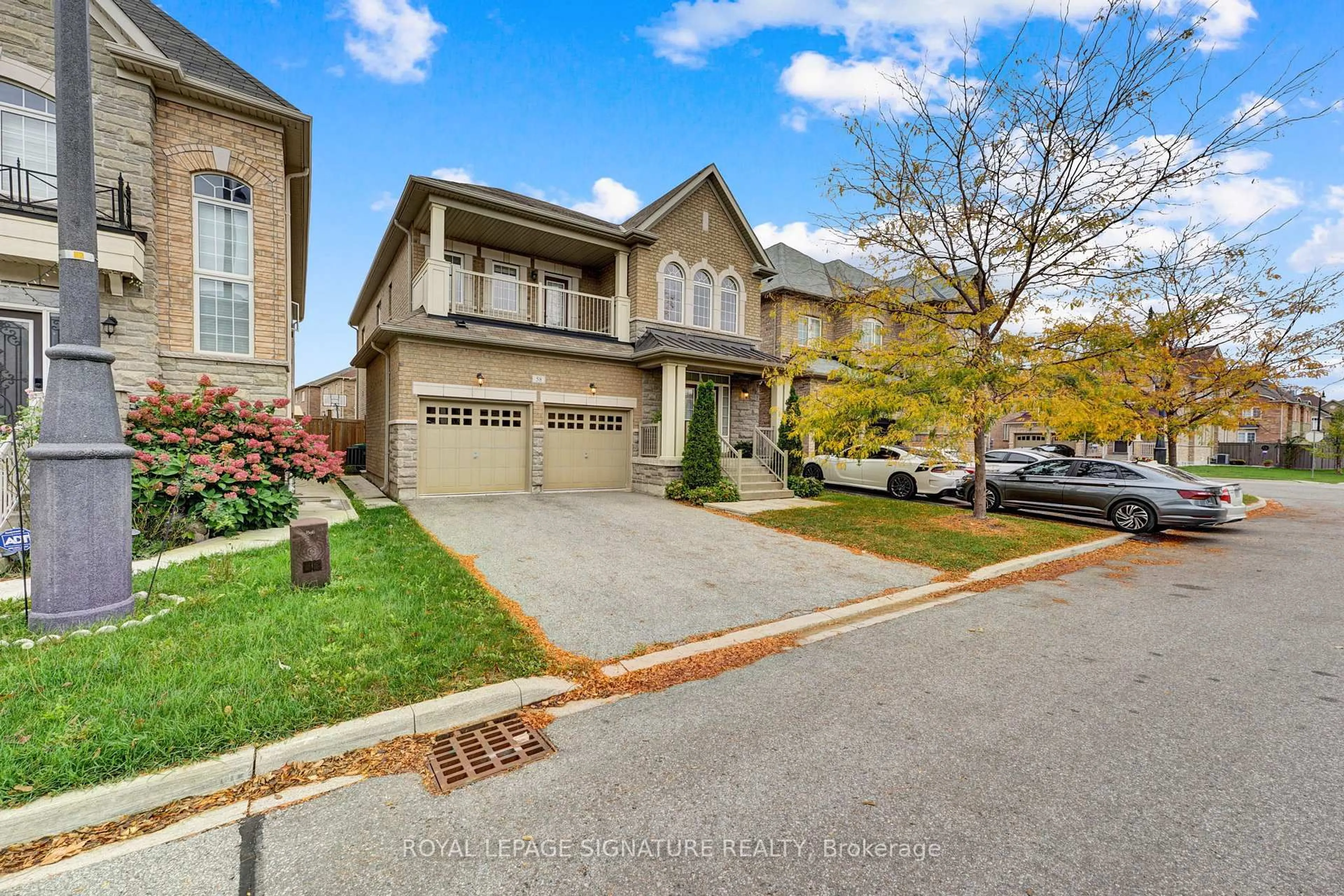 Home with brick exterior material, street for 58 Orangeblossom Tr, Brampton Ontario L6X 0E4