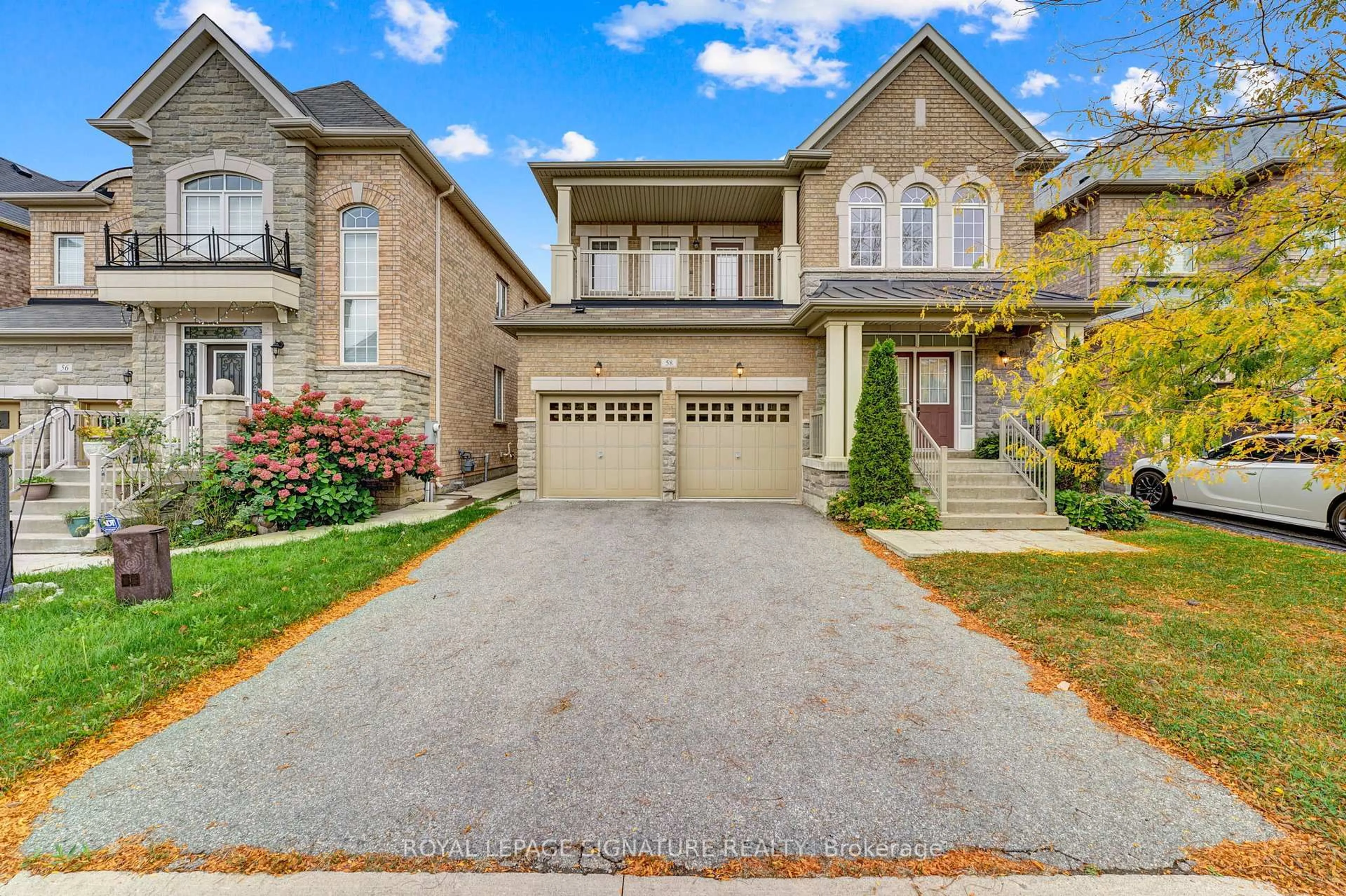 Home with brick exterior material, street for 58 Orangeblossom Tr, Brampton Ontario L6X 0E4