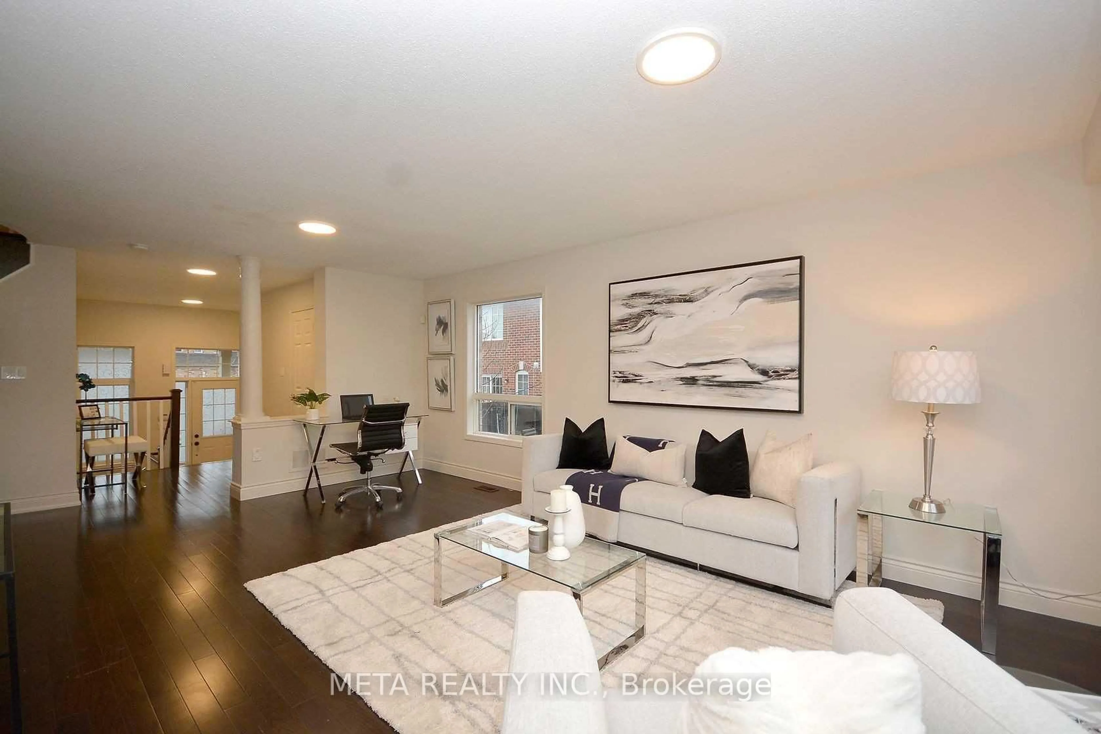 Living room with furniture, wood/laminate floor for 5 Georgian Rd, Brampton Ontario L6X 0L6