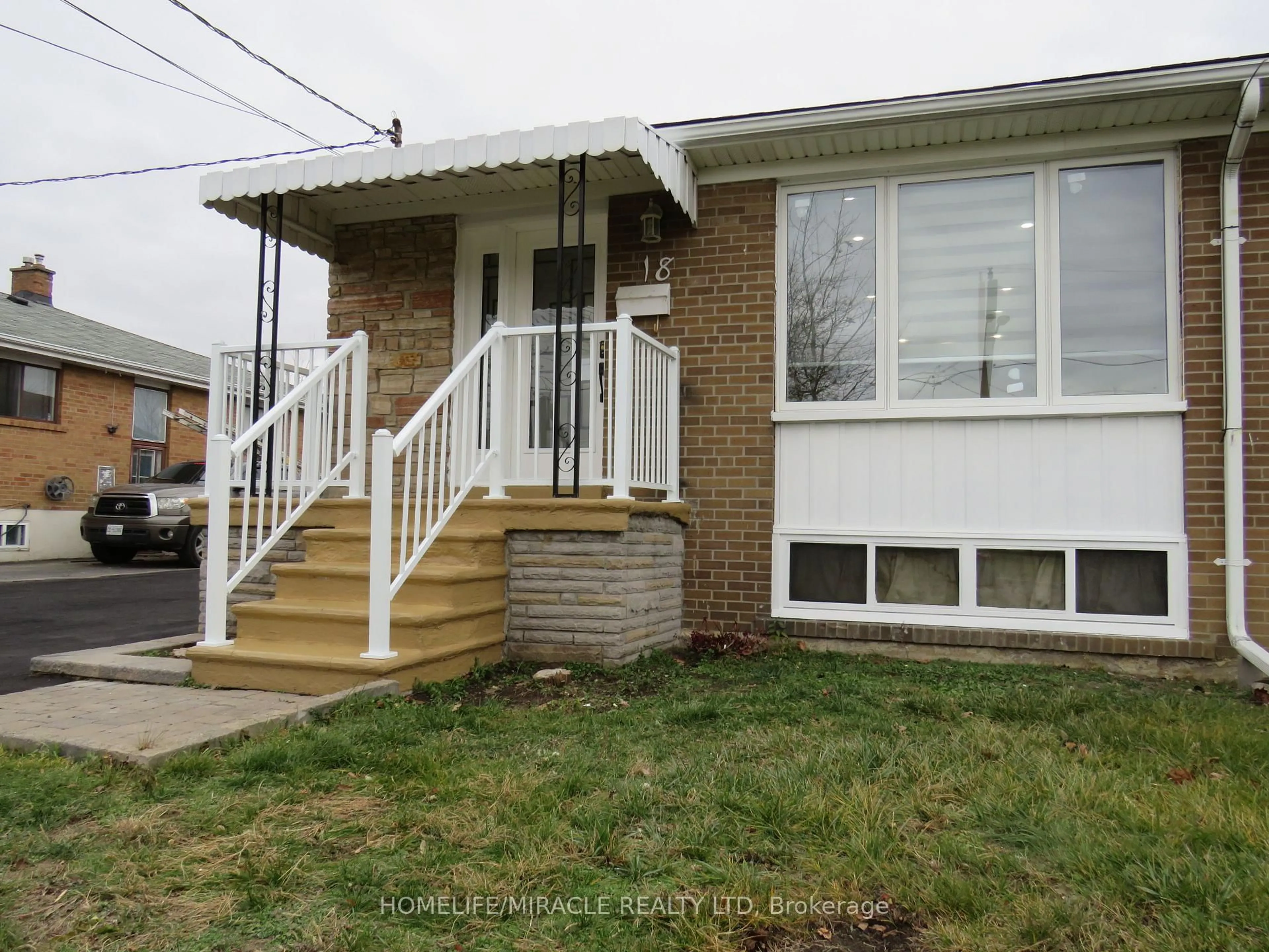 Home with vinyl exterior material, street for 18 Rubydale Gdns, Toronto Ontario M9L 1B9