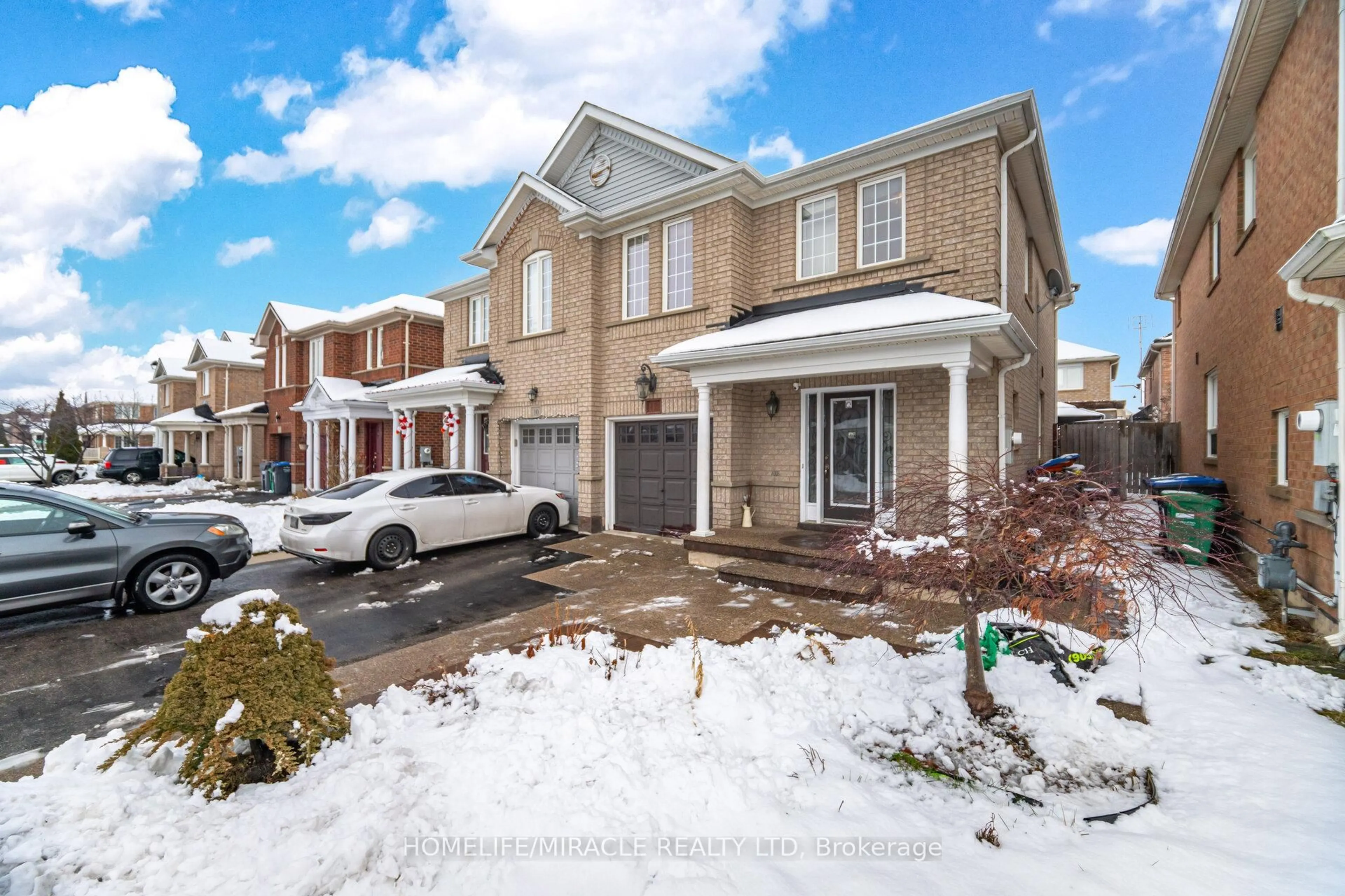 Home with brick exterior material, street for 12 Hollingsworth Circ, Brampton Ontario L7A 0J7