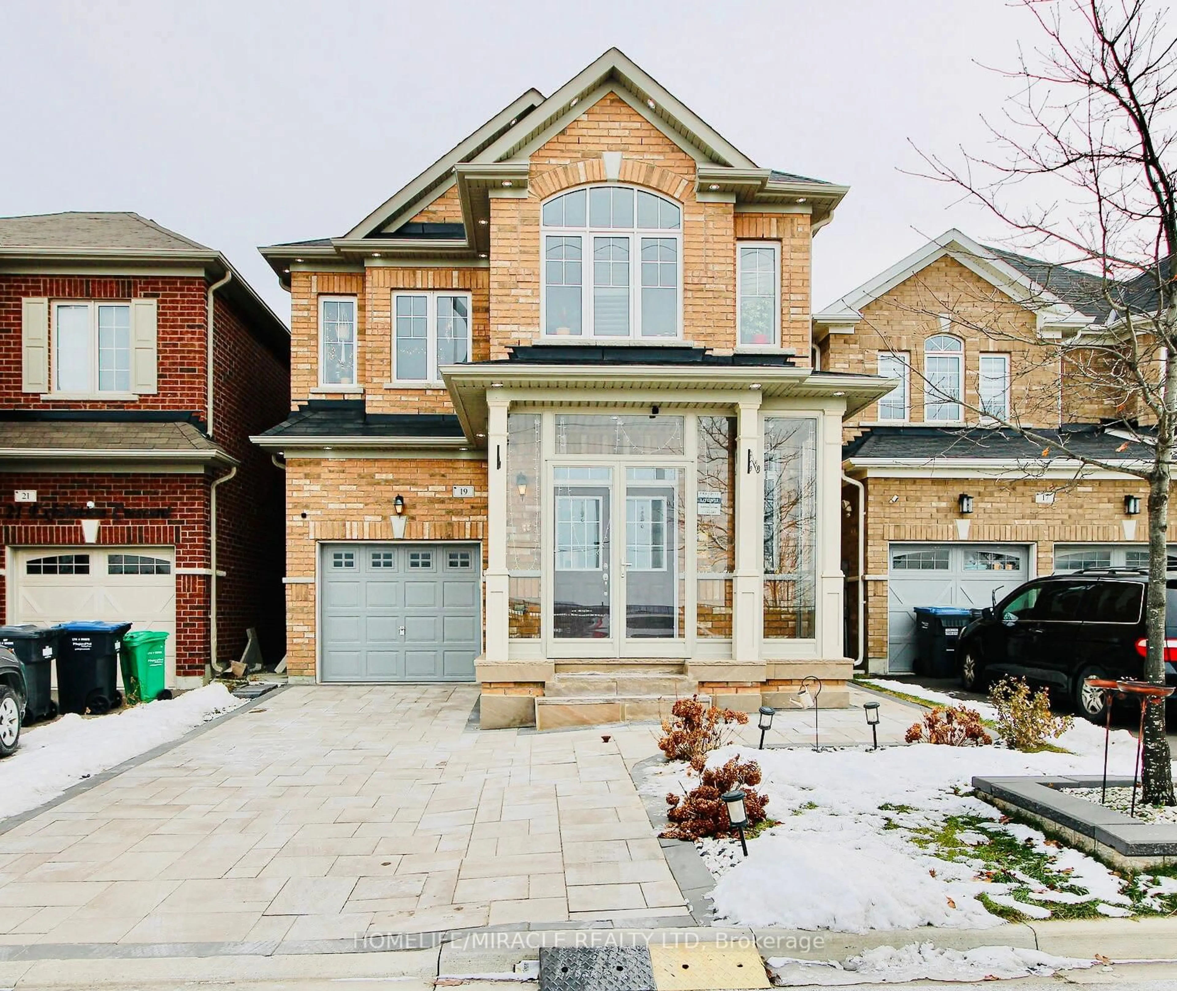 Home with brick exterior material, street for 19 Exhibition Cres, Brampton Ontario L7A 4B9