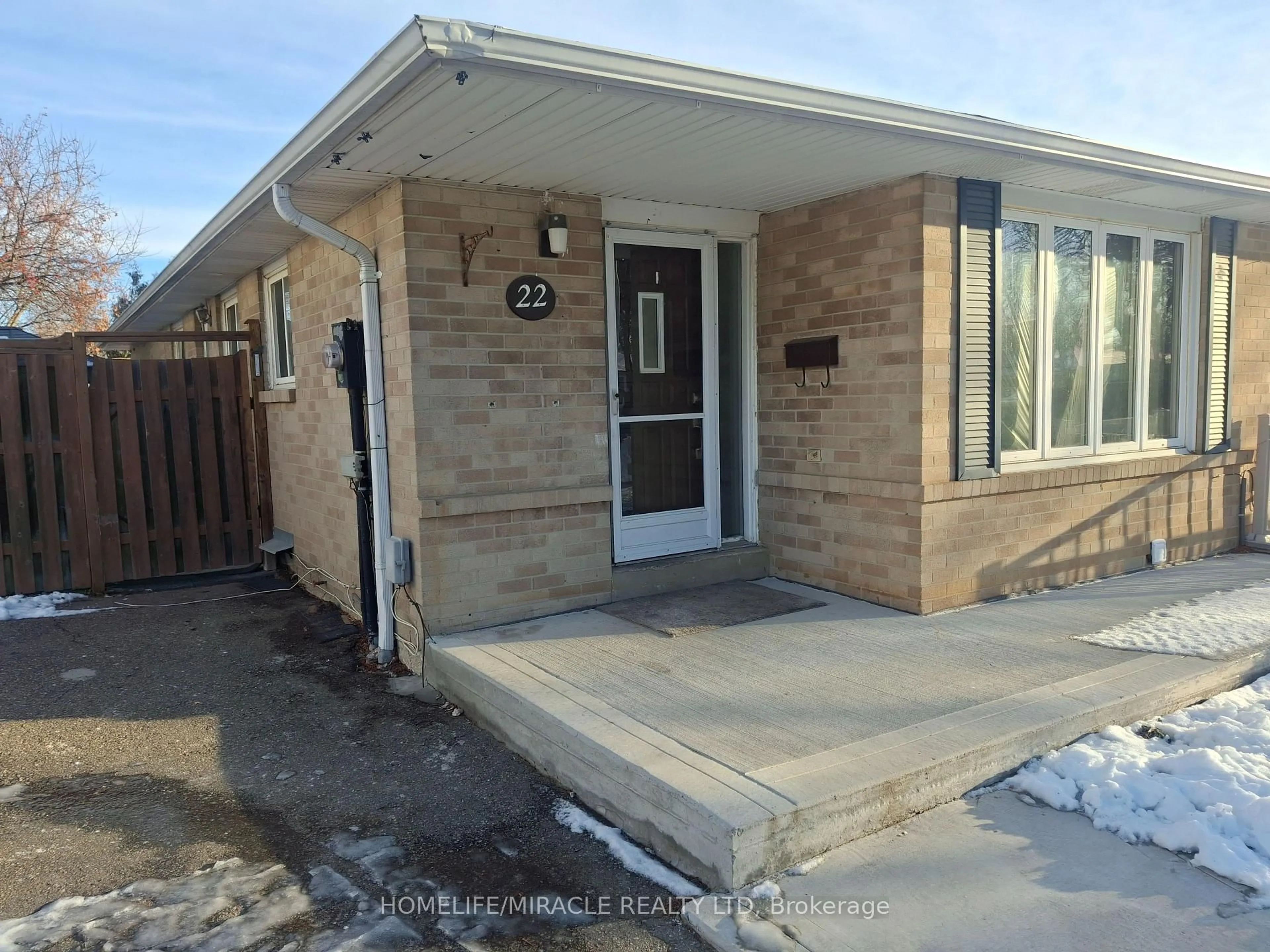Home with brick exterior material, street for 22 Graymar Rd, Brampton Ontario L6S 1Z8