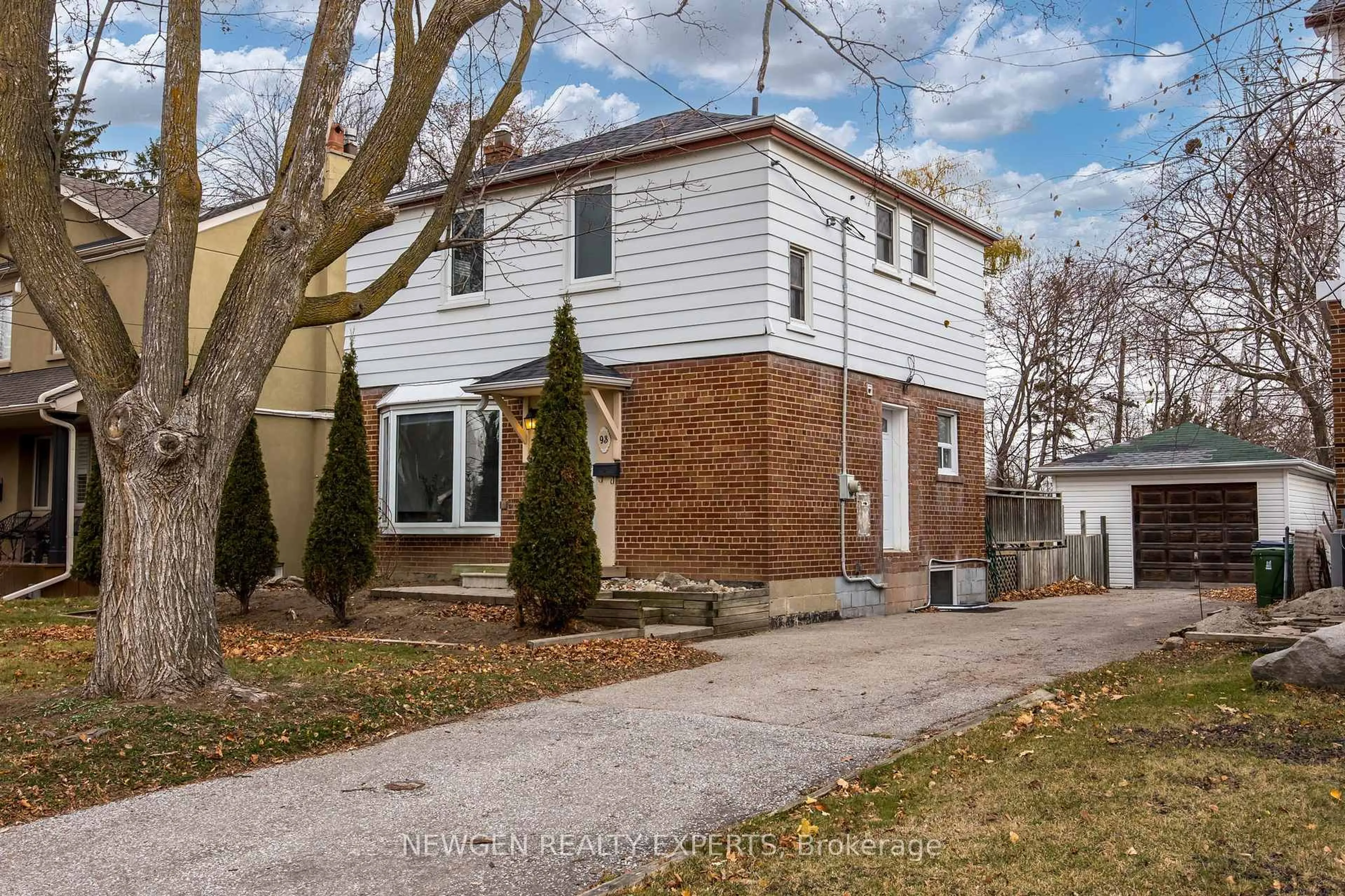Home with brick exterior material, street for 93 Ashbourne Dr, Toronto Ontario M9B 4H6