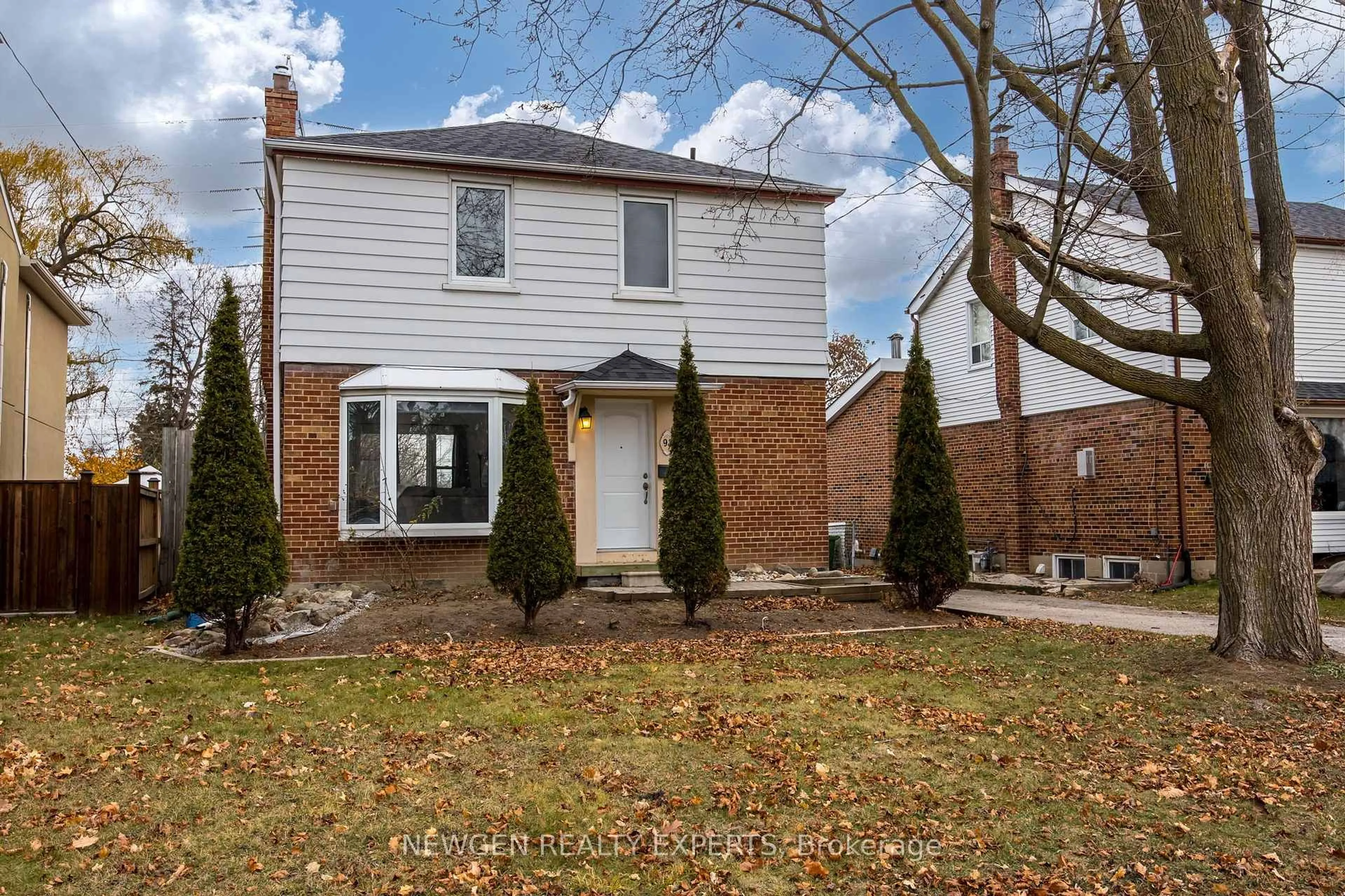 Home with brick exterior material, street for 93 Ashbourne Dr, Toronto Ontario M9B 4H6