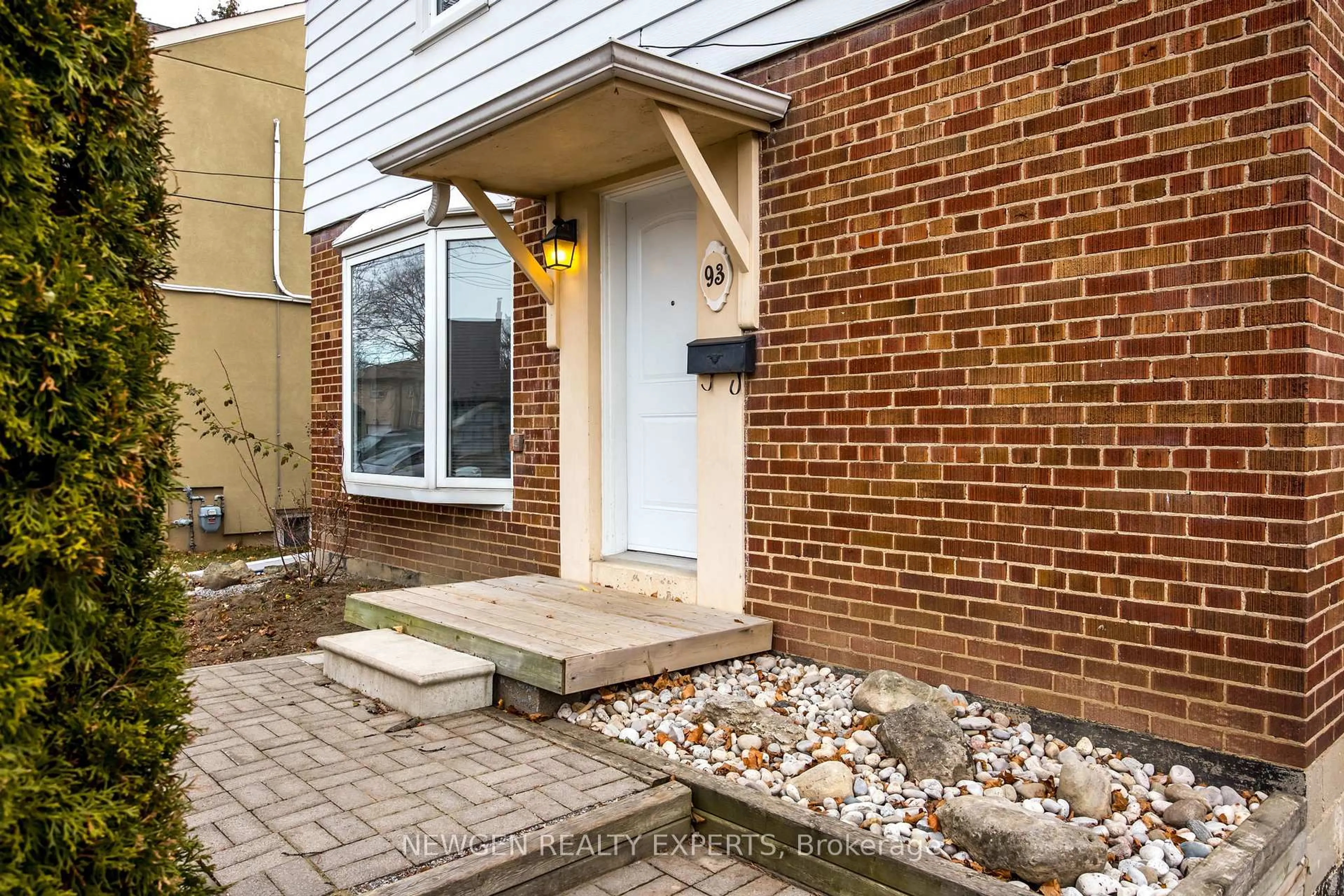 Home with brick exterior material, street for 93 Ashbourne Dr, Toronto Ontario M9B 4H6