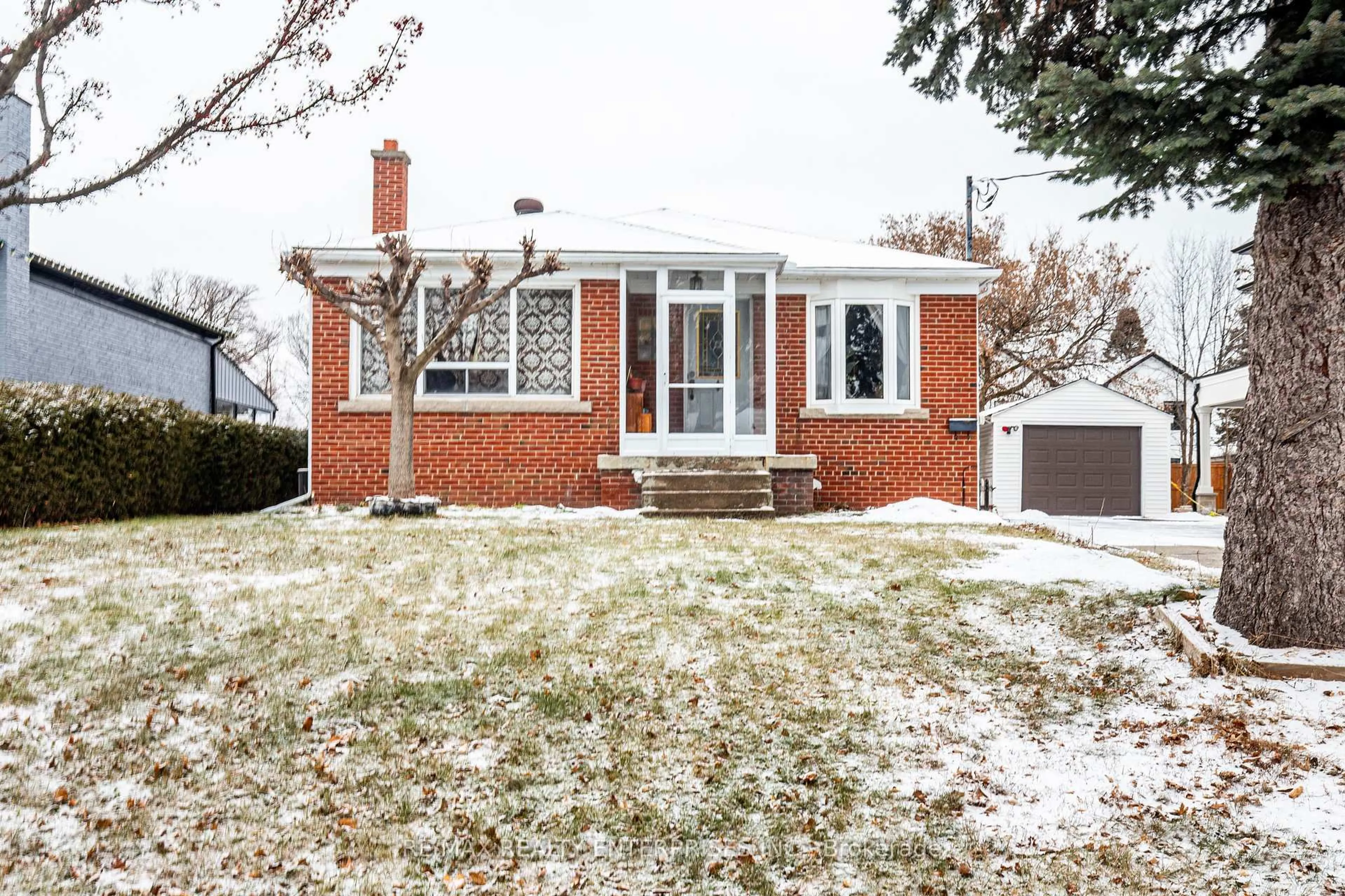 Home with brick exterior material, street for 257 Woodale Ave, Oakville Ontario L6K 2N3