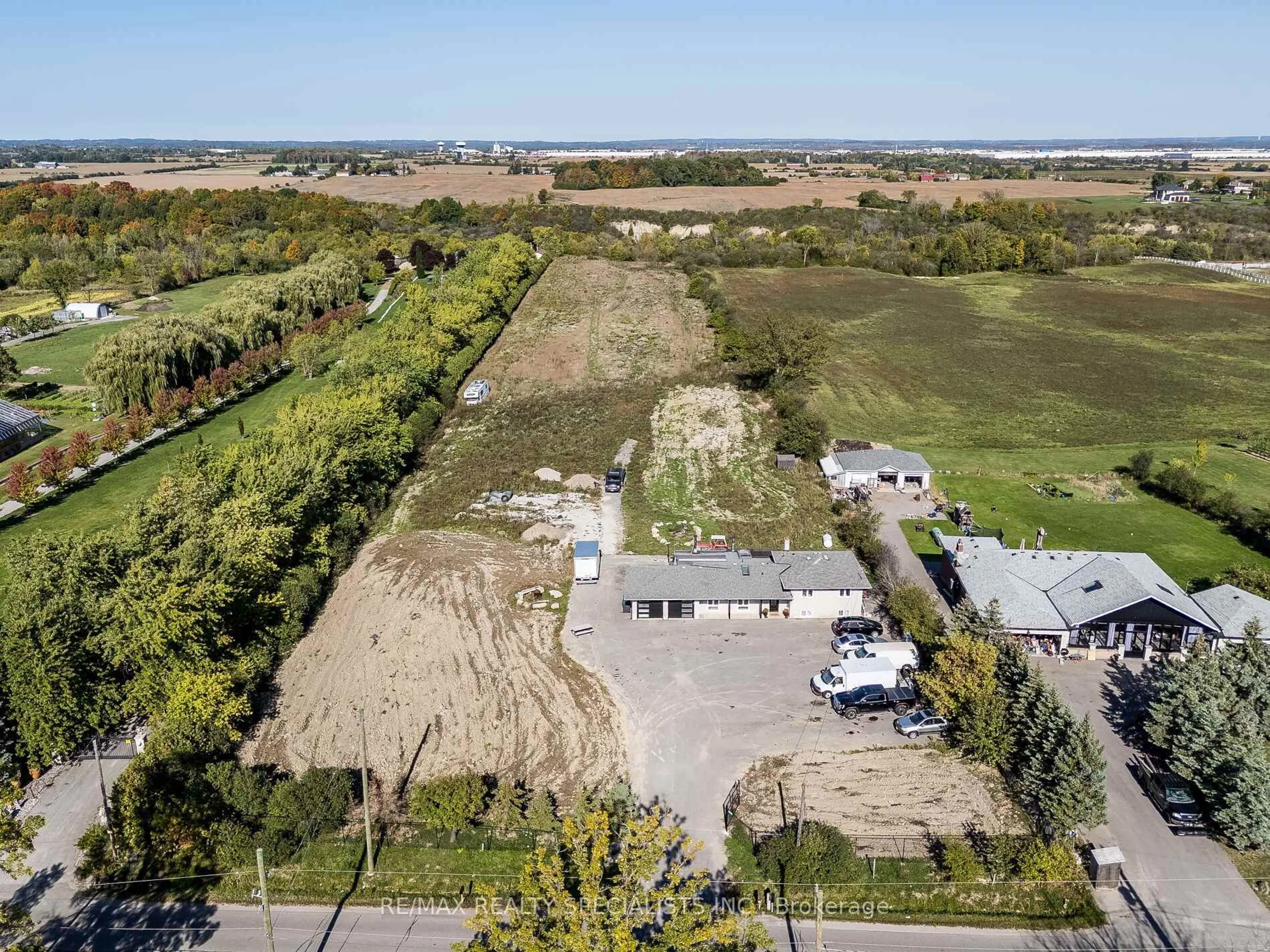 A pic from outside/outdoor area/front of a property/back of a property/a pic from drone, street for 13207 Centreville Creek Dr, Caledon Ontario L7C 3B8