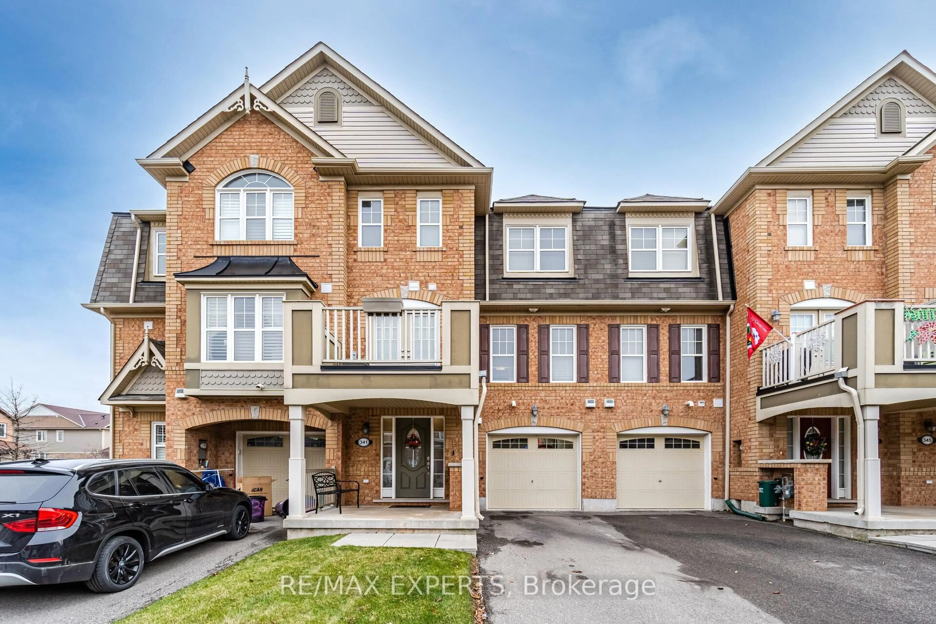 Home with brick exterior material, street for 341 Cavanagh Lane, Milton Ontario L9T 8G2