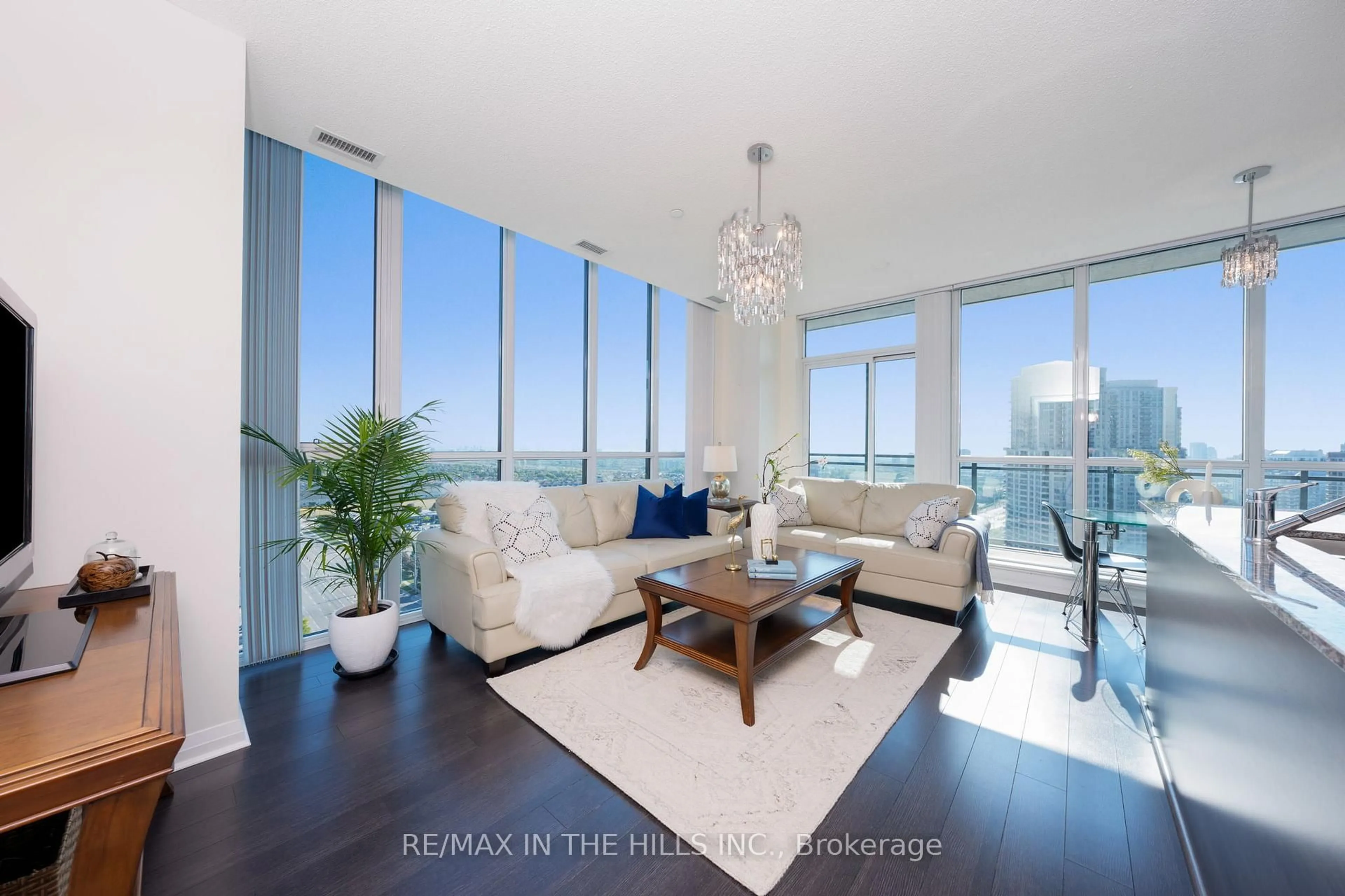 Living room with furniture, unknown for 55 Eglinton Ave #2007, Mississauga Ontario L5R 0E4